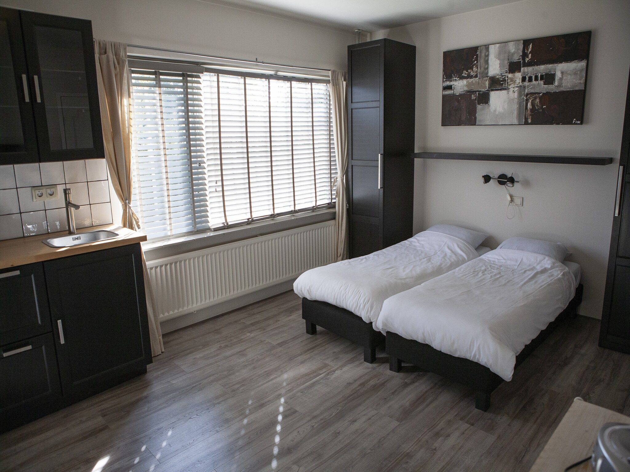 Een slaapkamer van Recreatiepark de Boshoek 18 in Voorthuizen