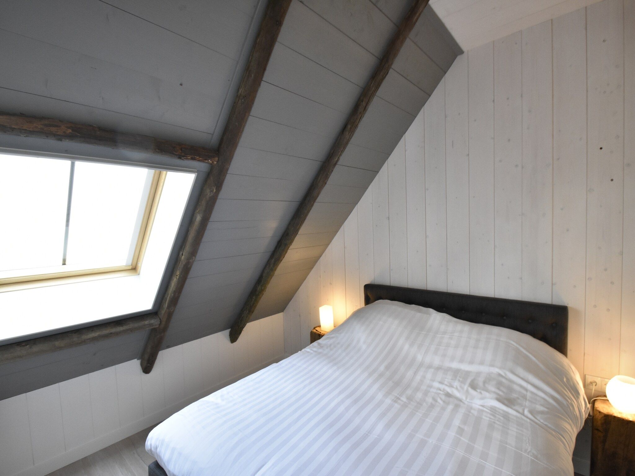 Een slaapkamer van Hazenborgh - Zon in Callantsoog