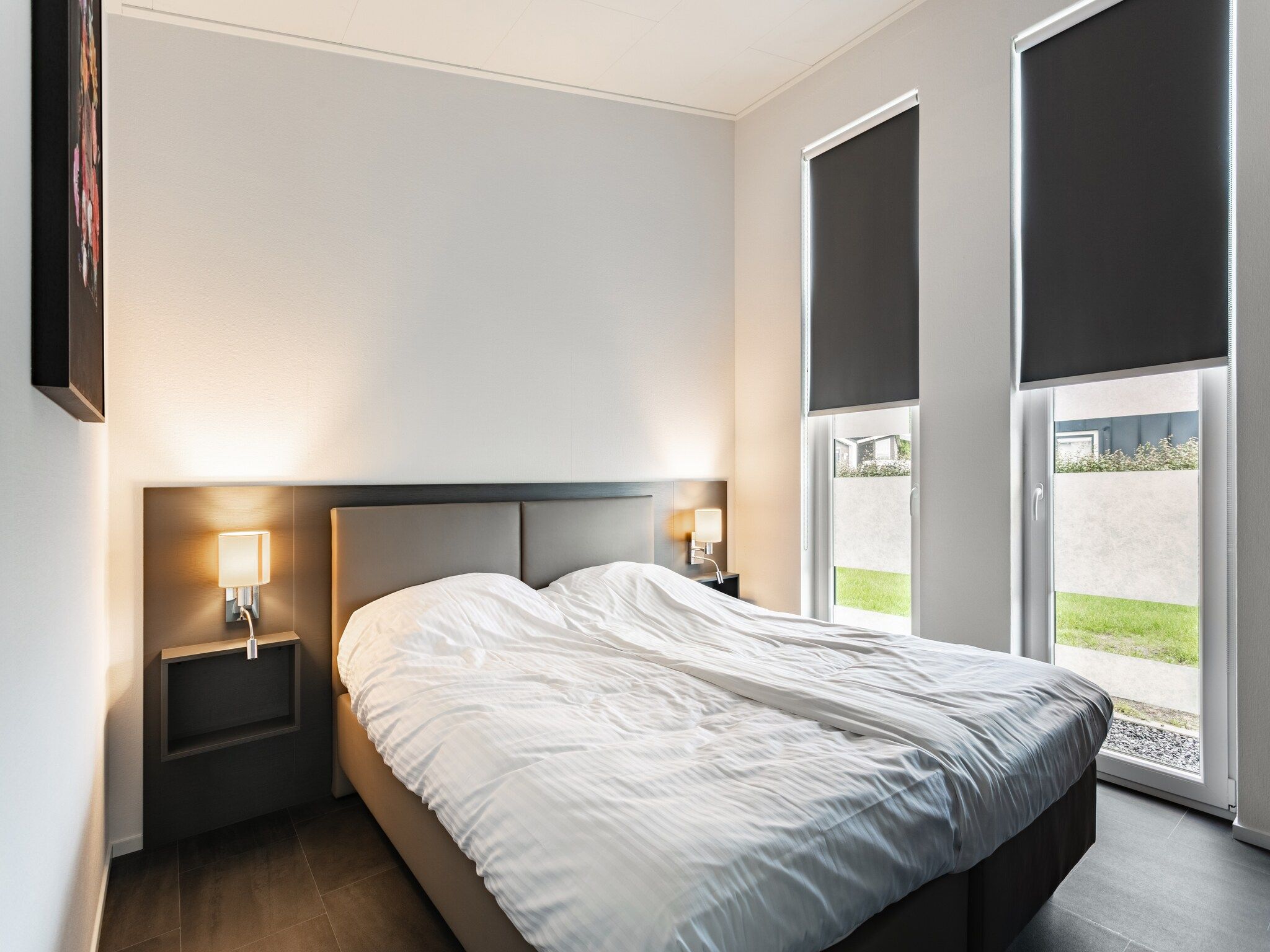 Een slaapkamer van Water Resort Oosterschelde 70 in Wemeldinge