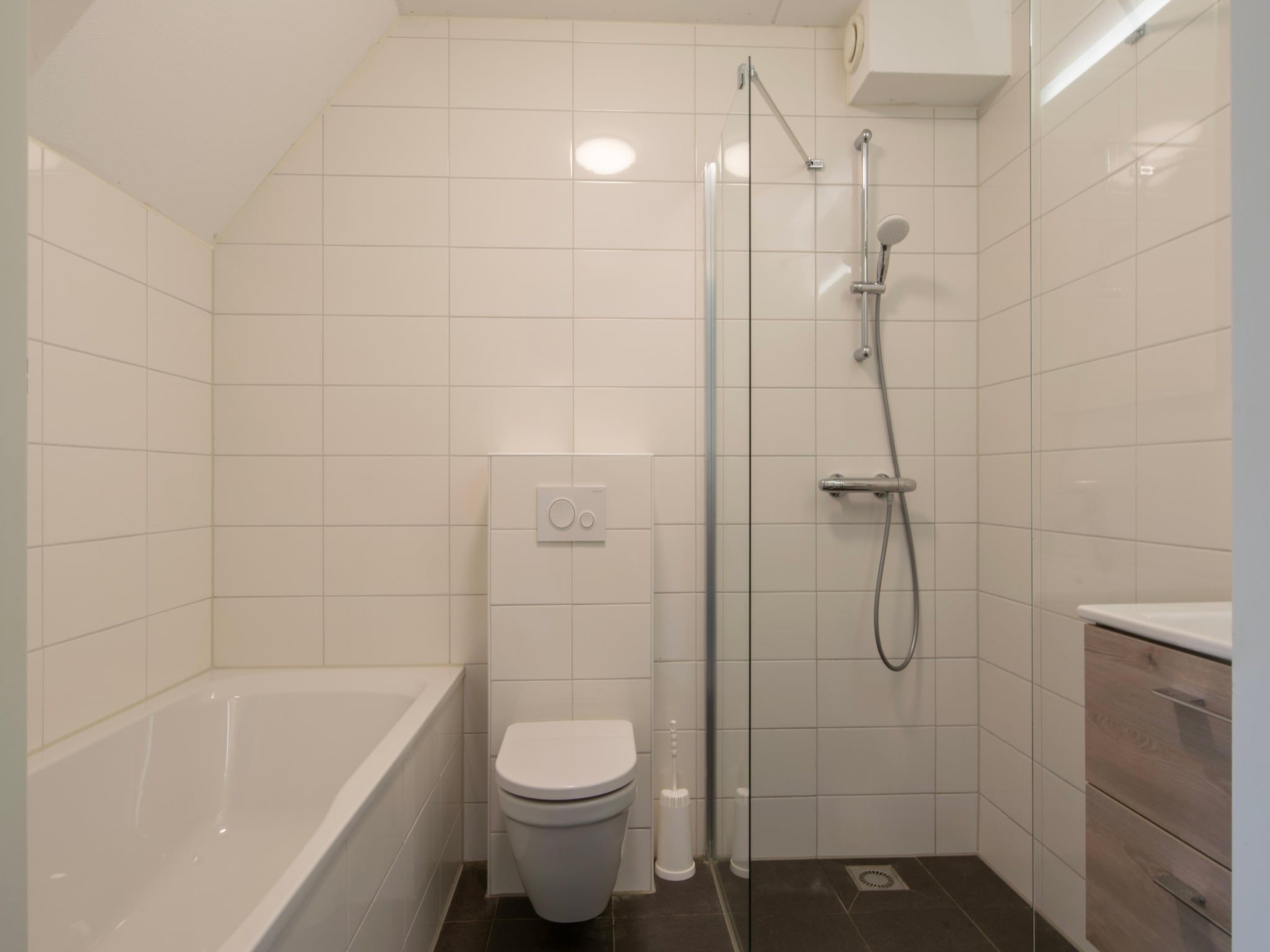 De badkamer van Vakantiepark de Soeten Haert 16 in Renesse