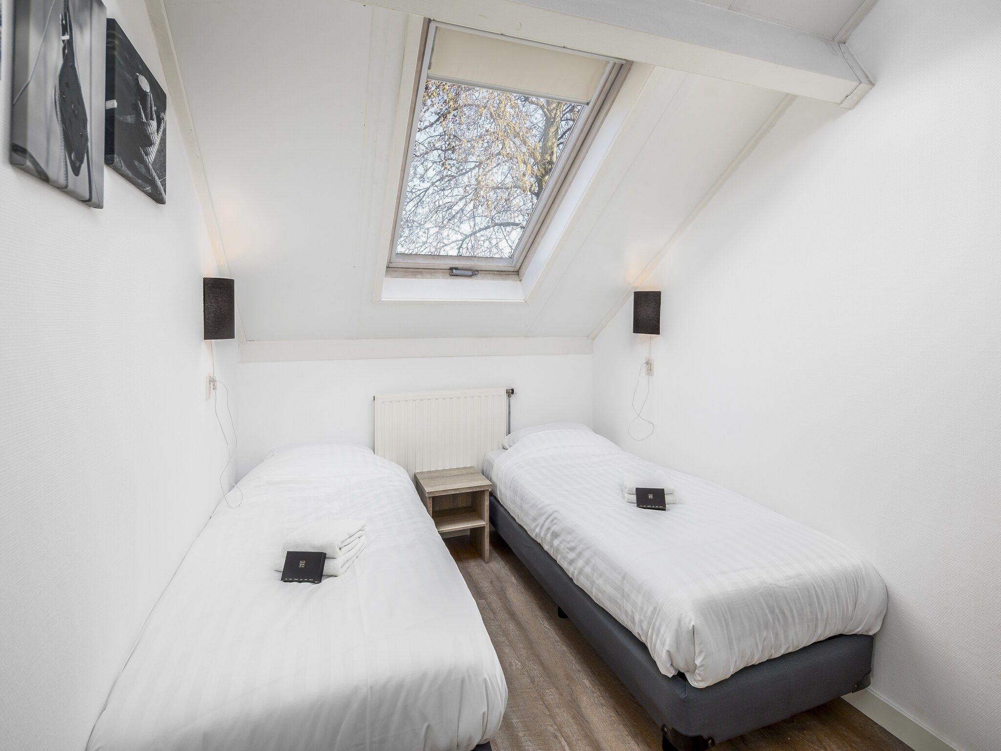 Een slaapkamer van Vakantiepark de Soeten Haert 16 in Renesse