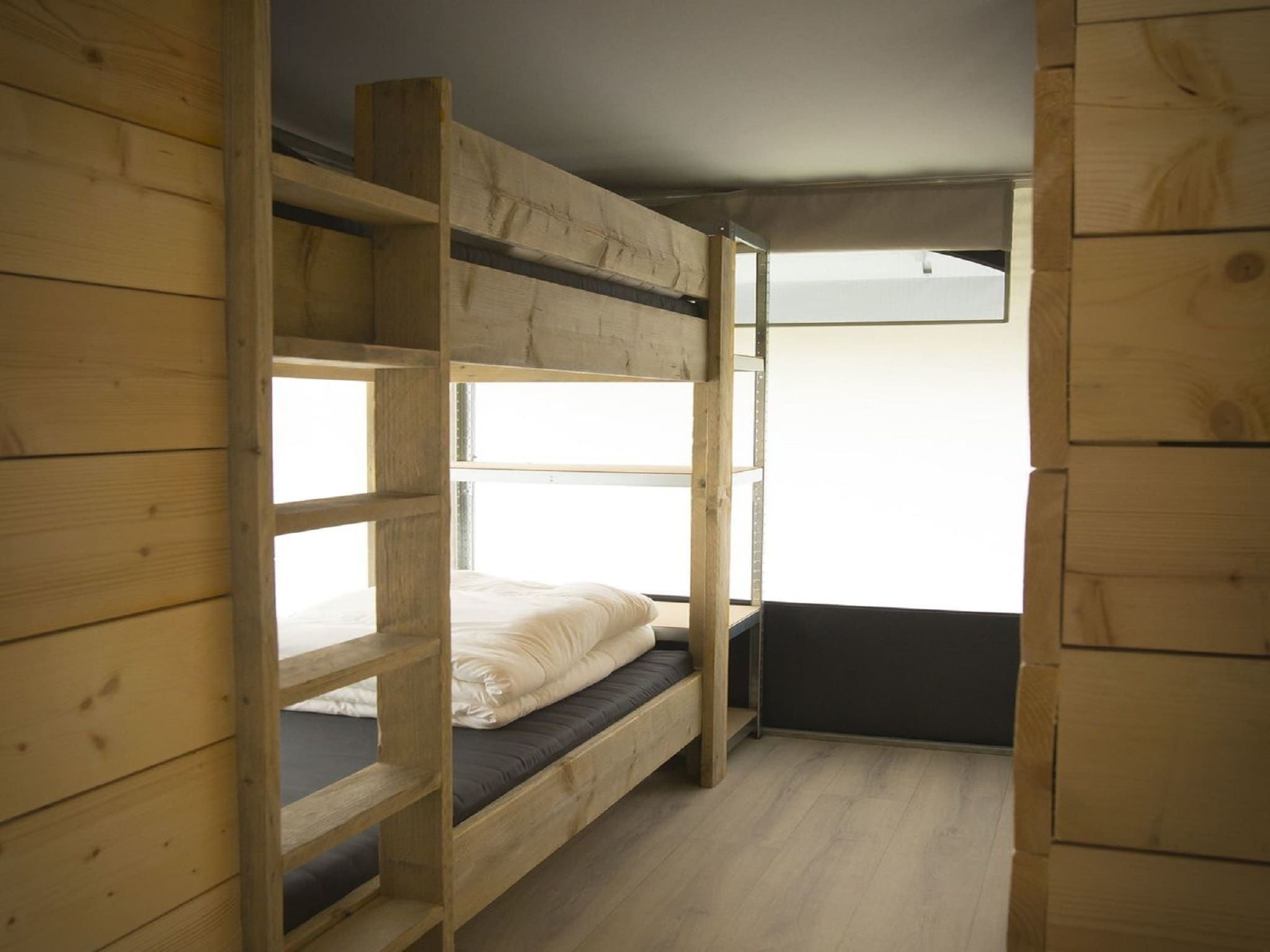 Een slaapkamer van Recreatiepark Duinhoeve 7 in Udenhout