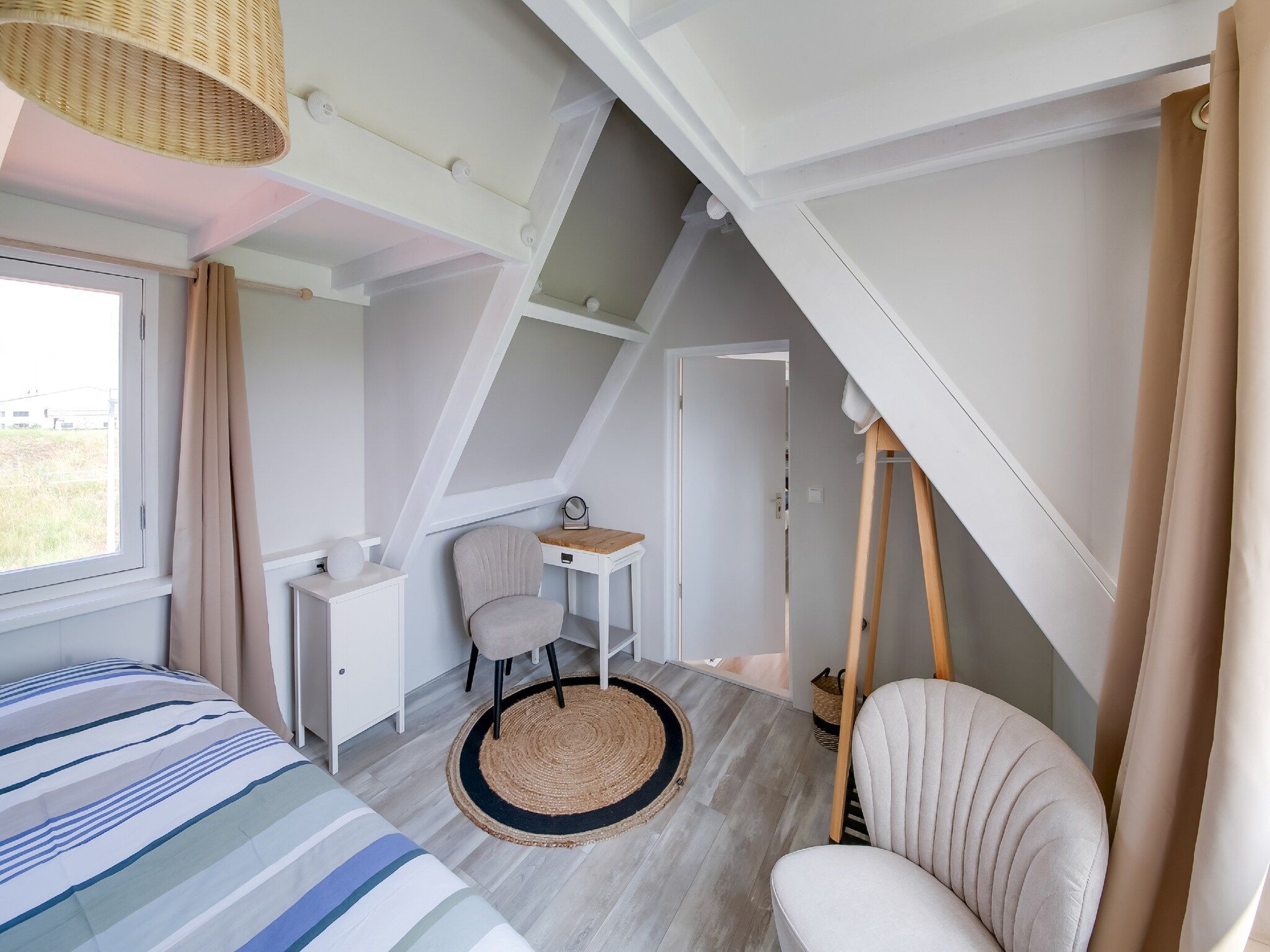 Een slaapkamer van Zilte Bries in Callantsoog