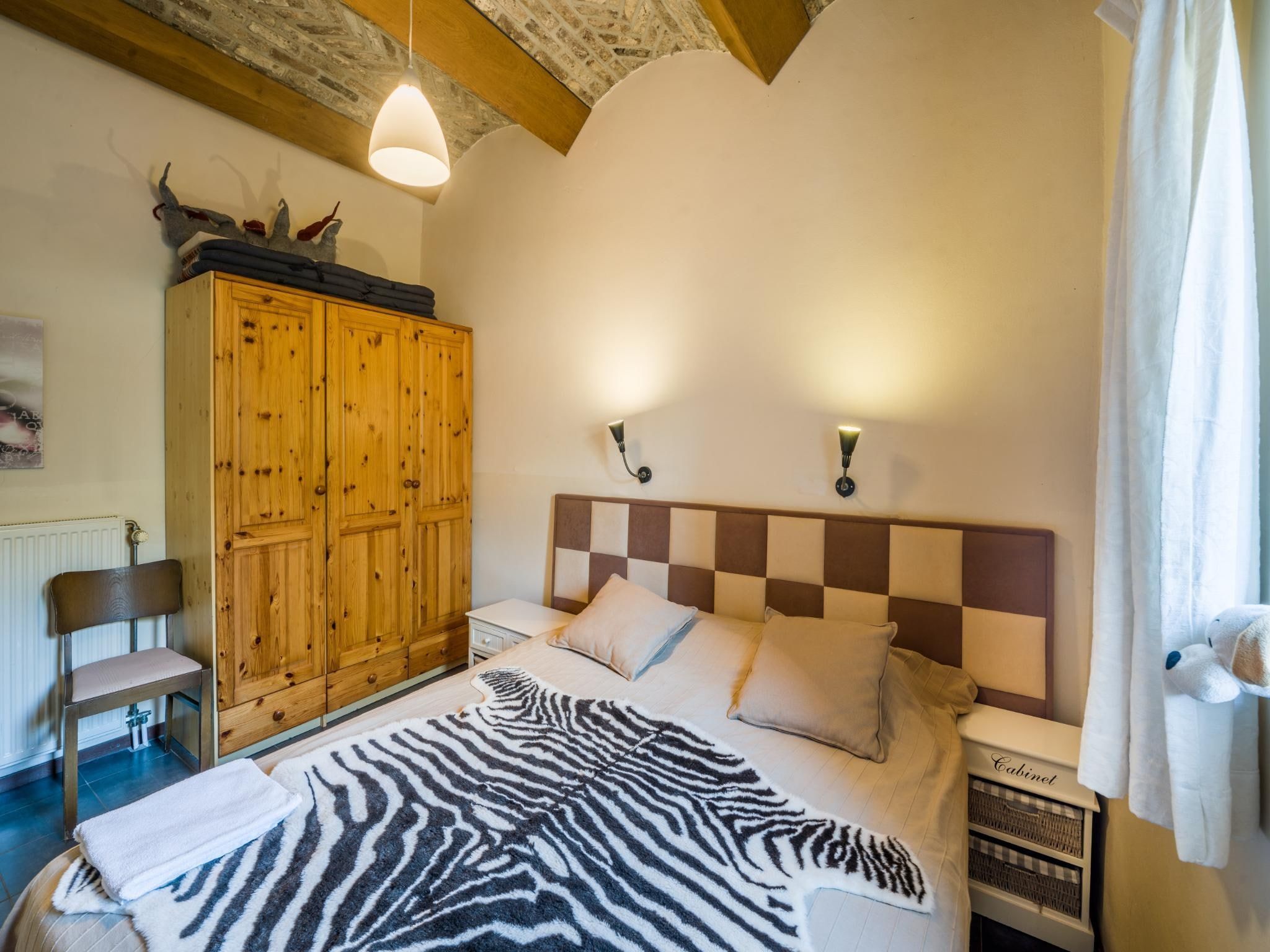 Een slaapkamer van Meschermolen 7 in Mesch-Eijsden