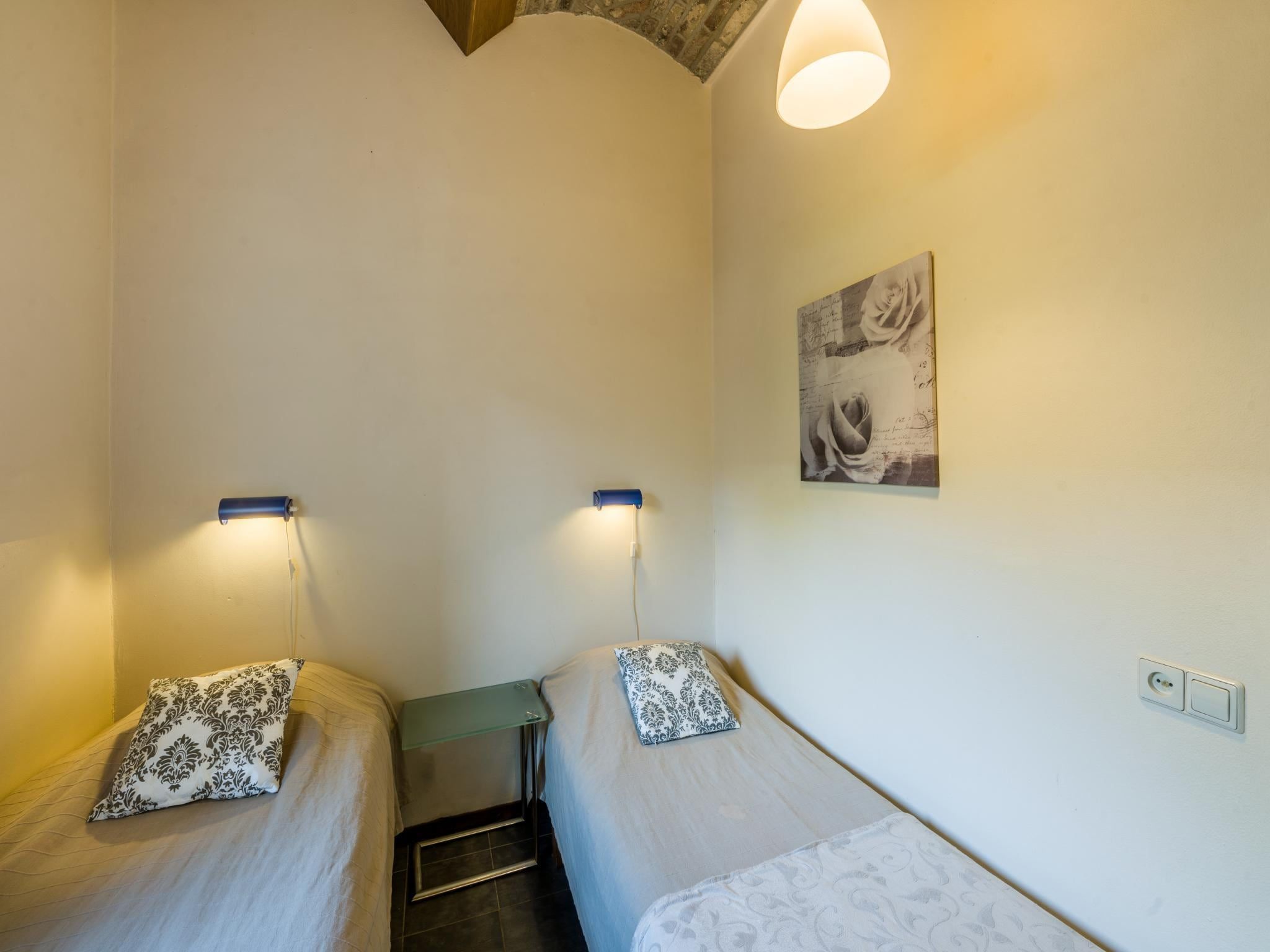Een slaapkamer van Meschermolen 7 in Mesch-Eijsden
