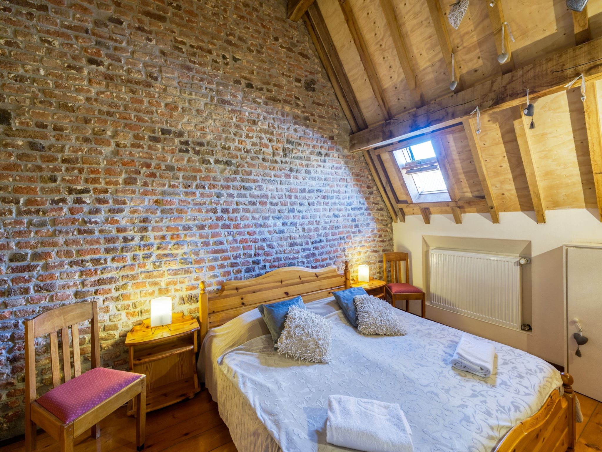 Een slaapkamer van Meschermolen 11 in Mesch-Eijsden