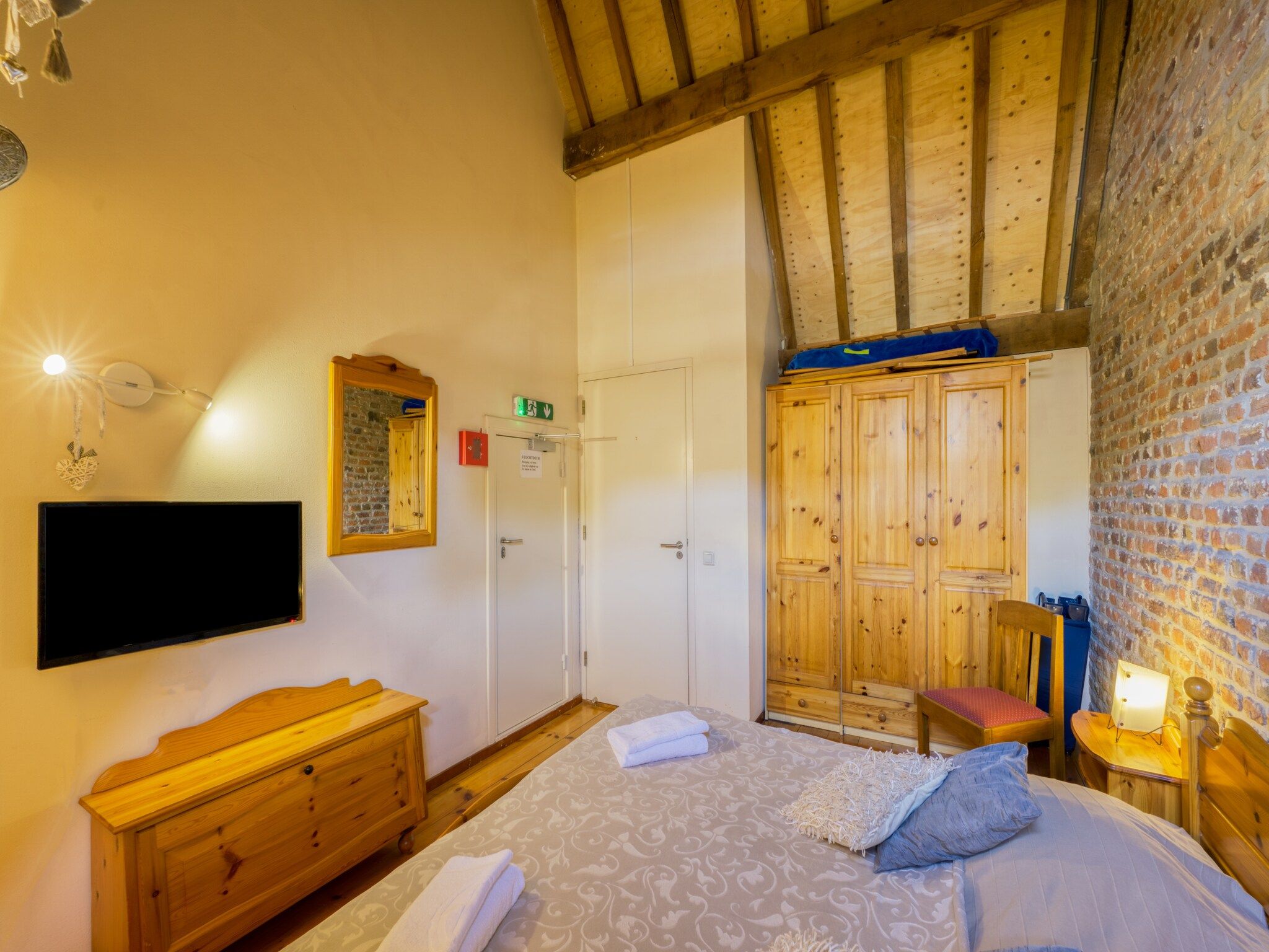 Een slaapkamer van Meschermolen 11 in Mesch-Eijsden
