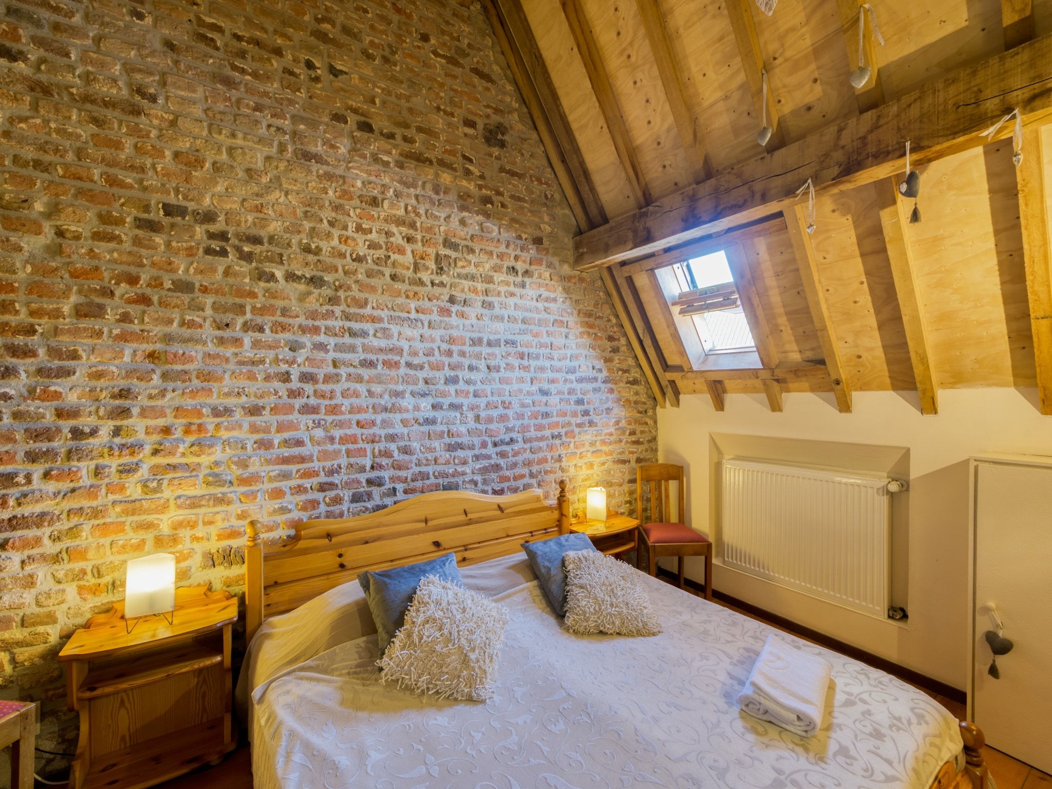 Een slaapkamer van Meschermolen 11 in Mesch-Eijsden