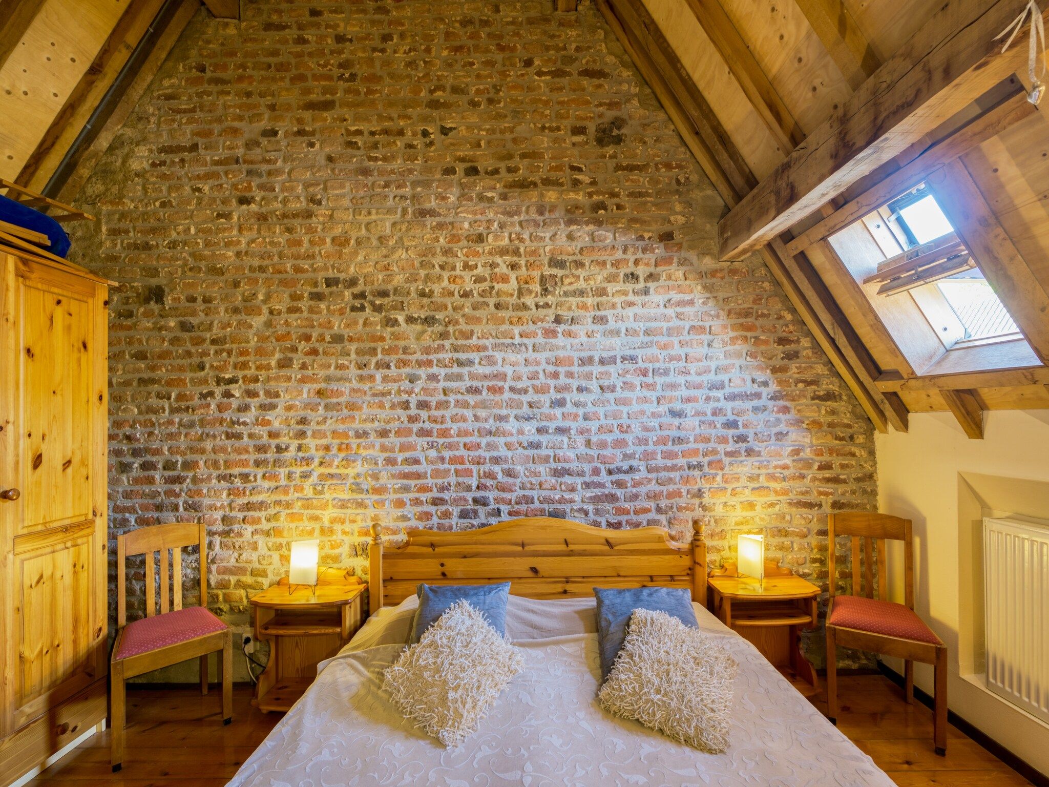 Een slaapkamer van Meschermolen 11 in Mesch-Eijsden