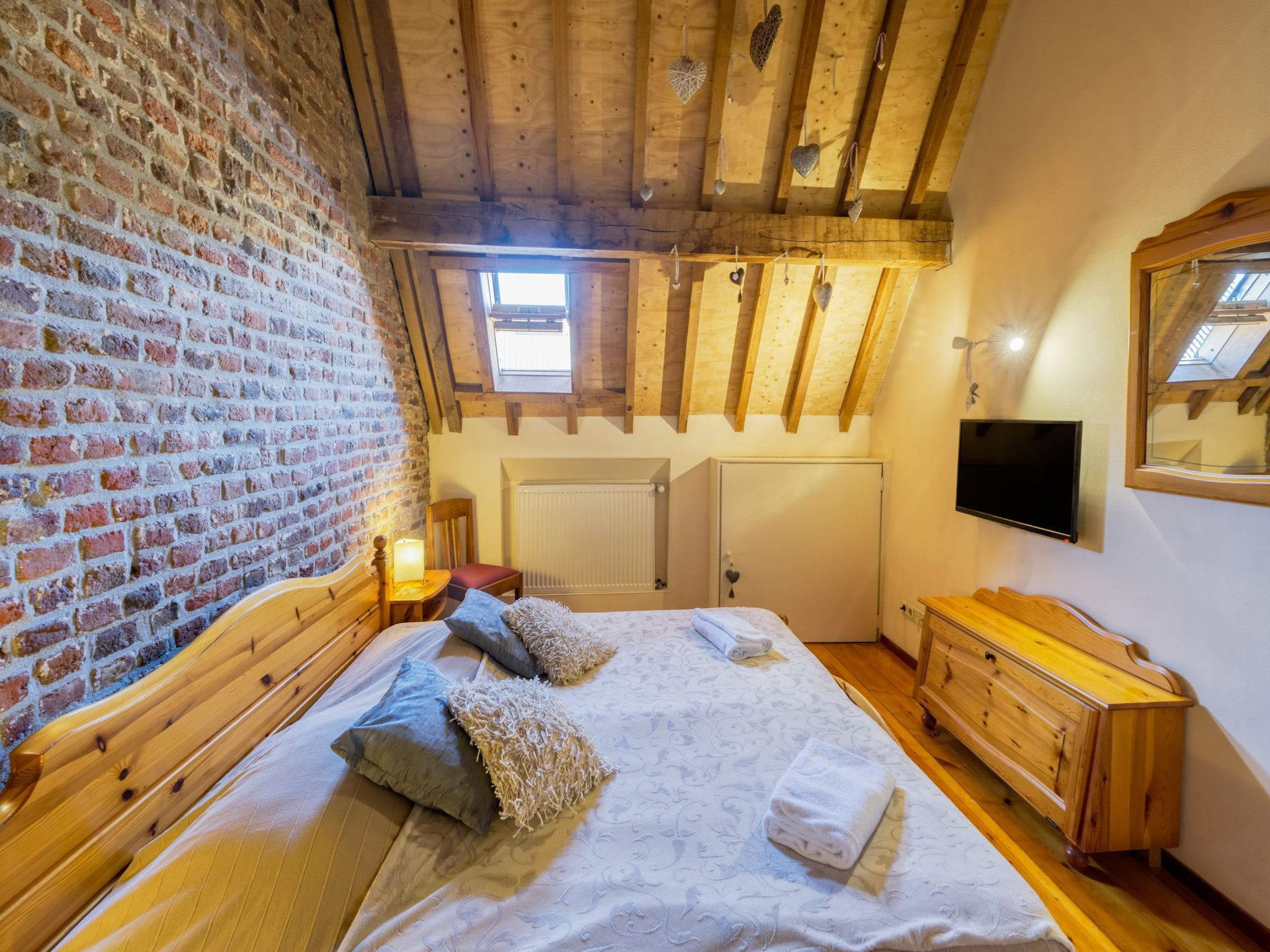 Een slaapkamer van Meschermolen 11 in Mesch-Eijsden