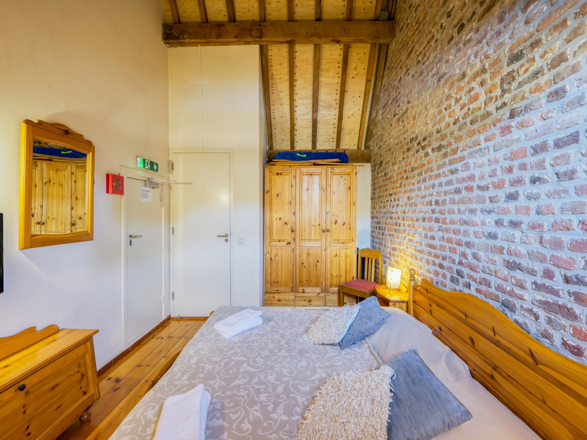 Een slaapkamer van Meschermolen 11 in Mesch-Eijsden