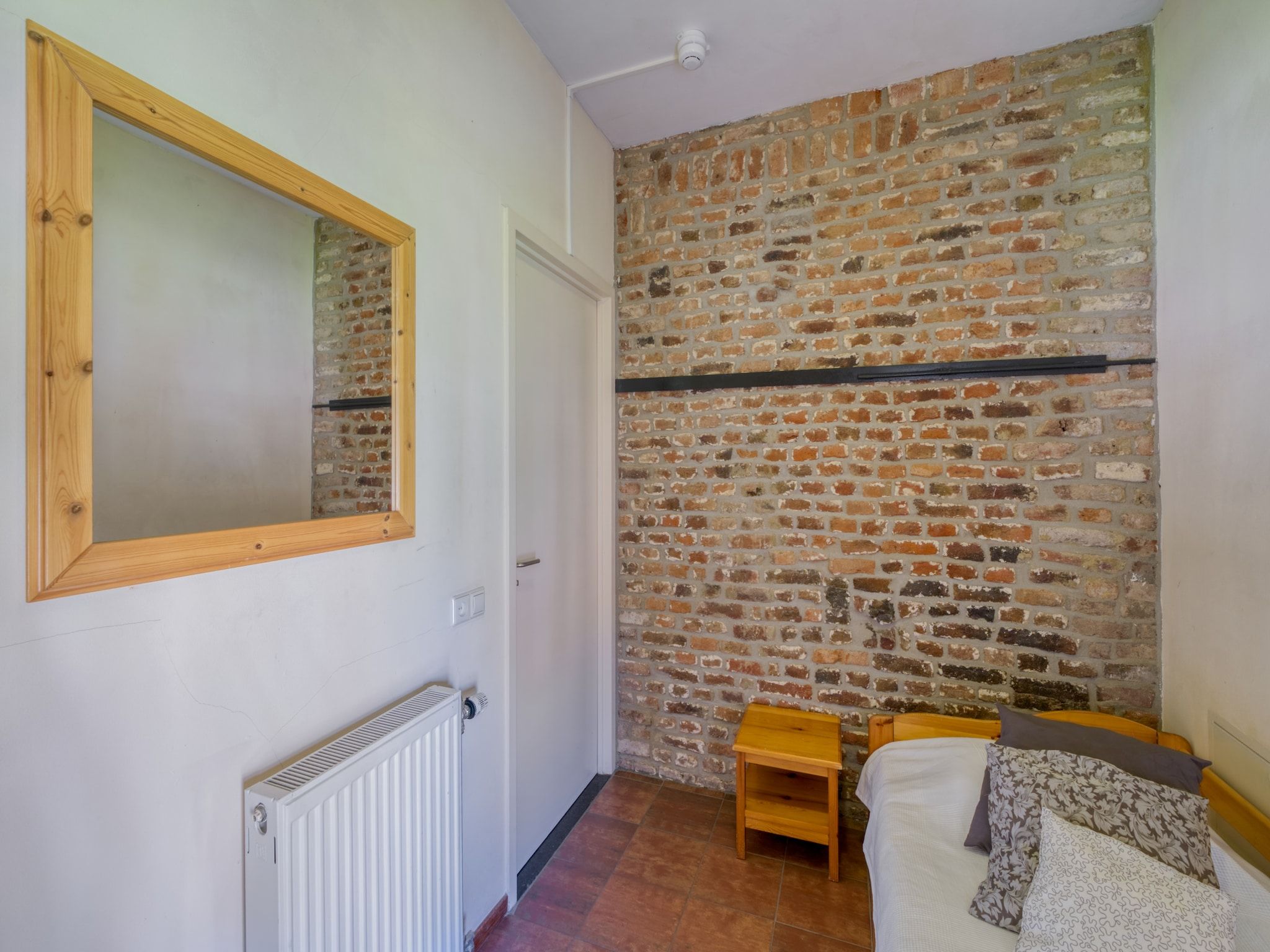 Een slaapkamer van Meschermolen 11 in Mesch-Eijsden