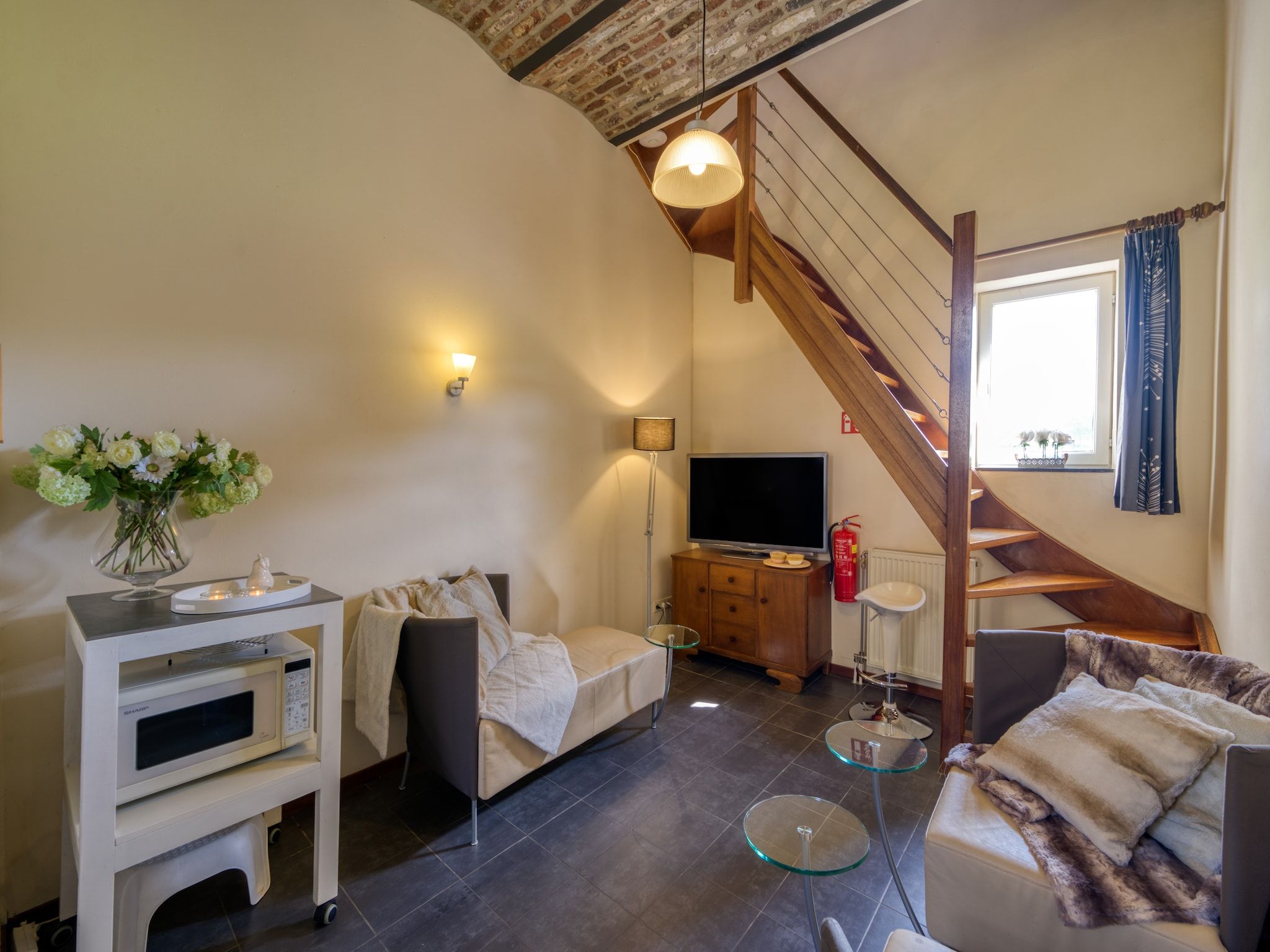 De woonkamer van Meschermolen 11 in Mesch-Eijsden