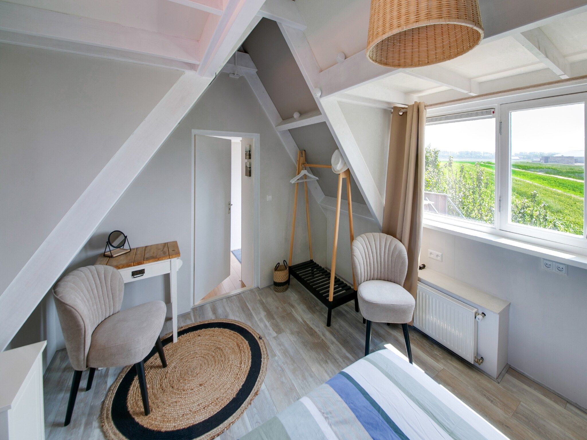 Een slaapkamer van Storm Bries in Callantsoog