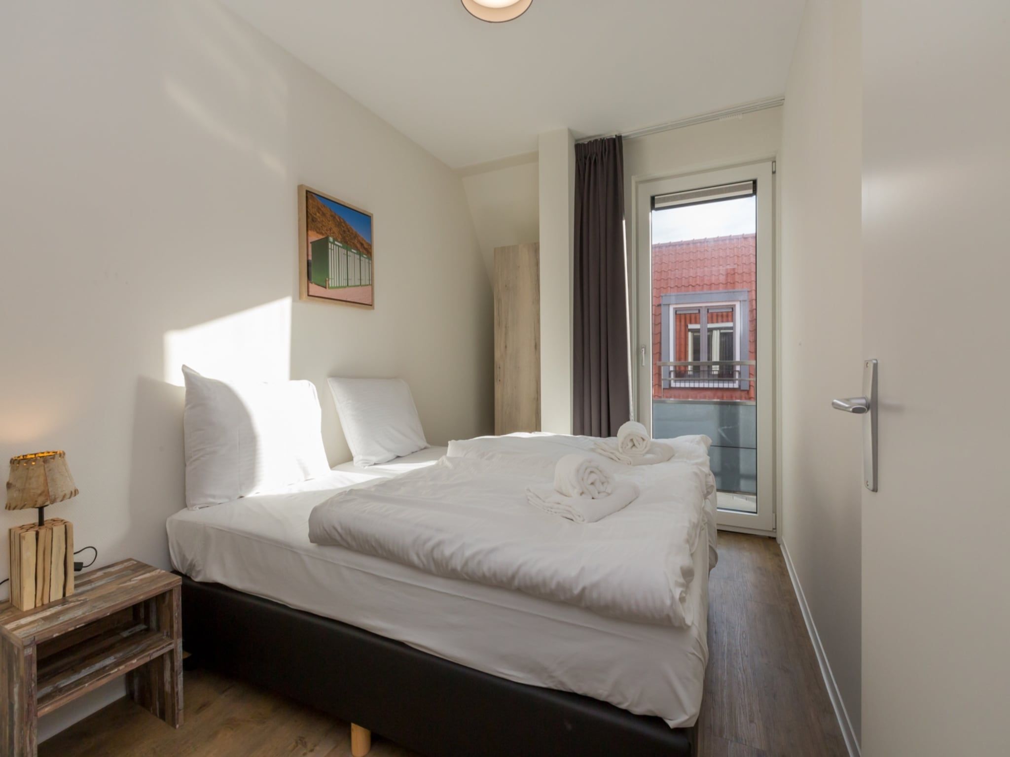 Een slaapkamer van Aparthotel Zoutelande - 4 pers luxe appartement in Zoutelande