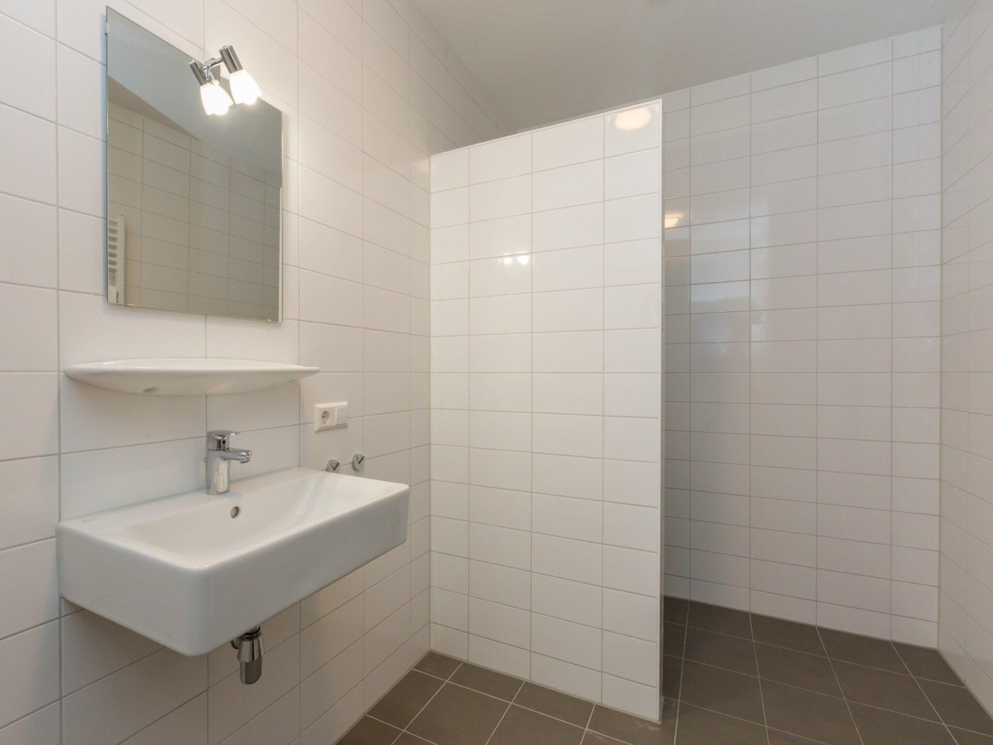De badkamer van Aparthotel Zoutelande - 4 pers luxe appartement in Zoutelande
