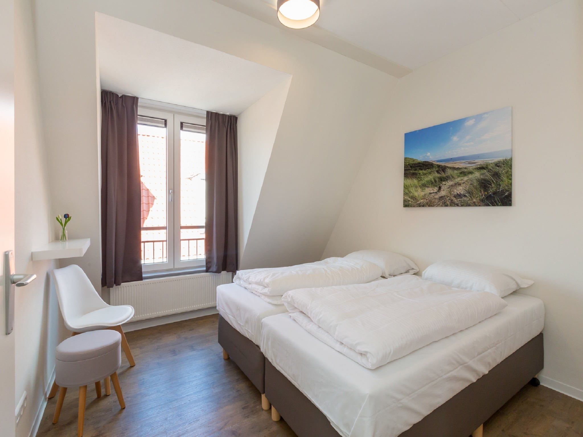 Een slaapkamer van Aparthotel Zoutelande - 6 pers luxe appartement in Zoutelande