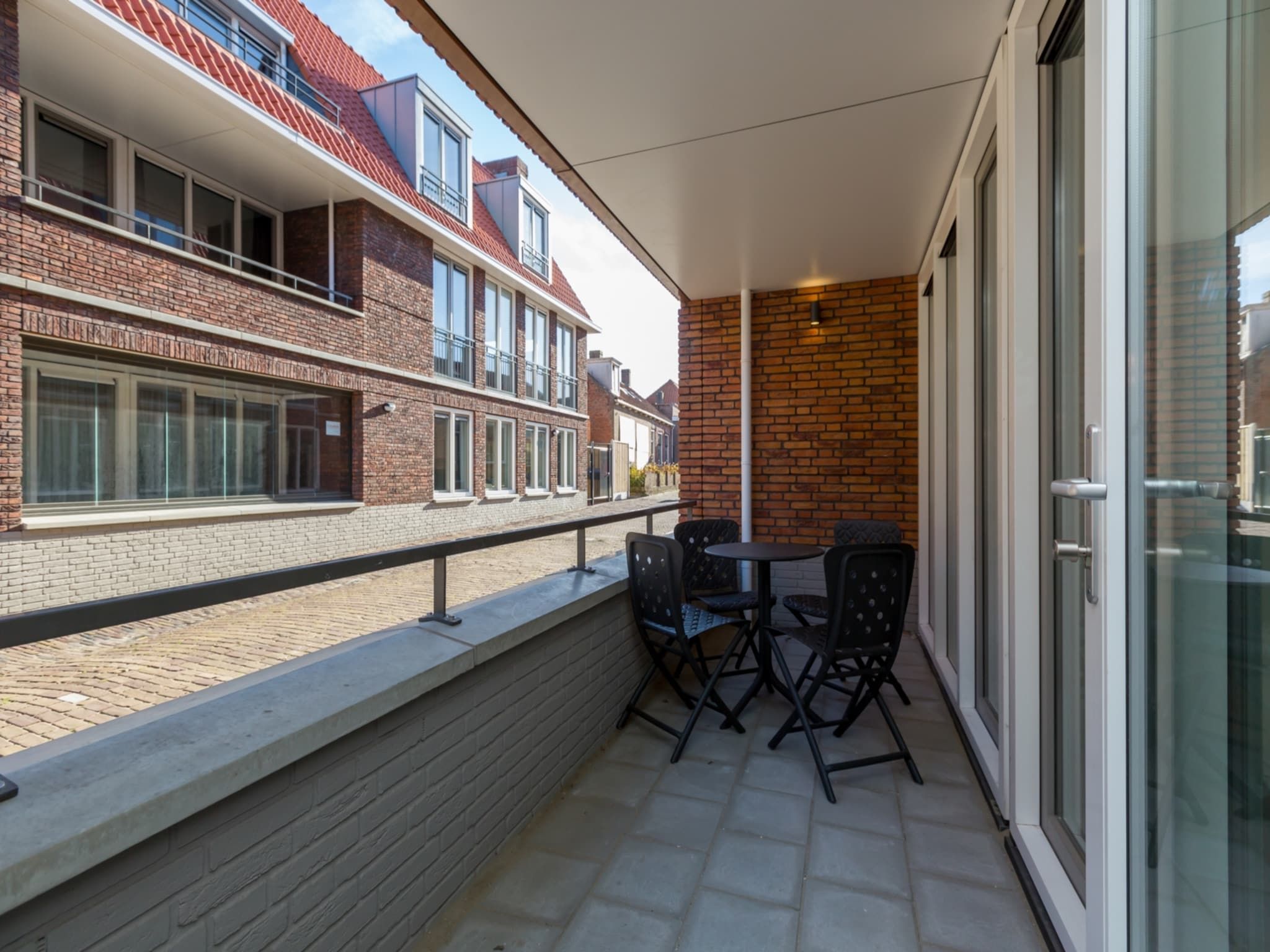Het terras van Aparthotel Zoutelande - 4 pers luxe appartement - huisdier in Zoutelande