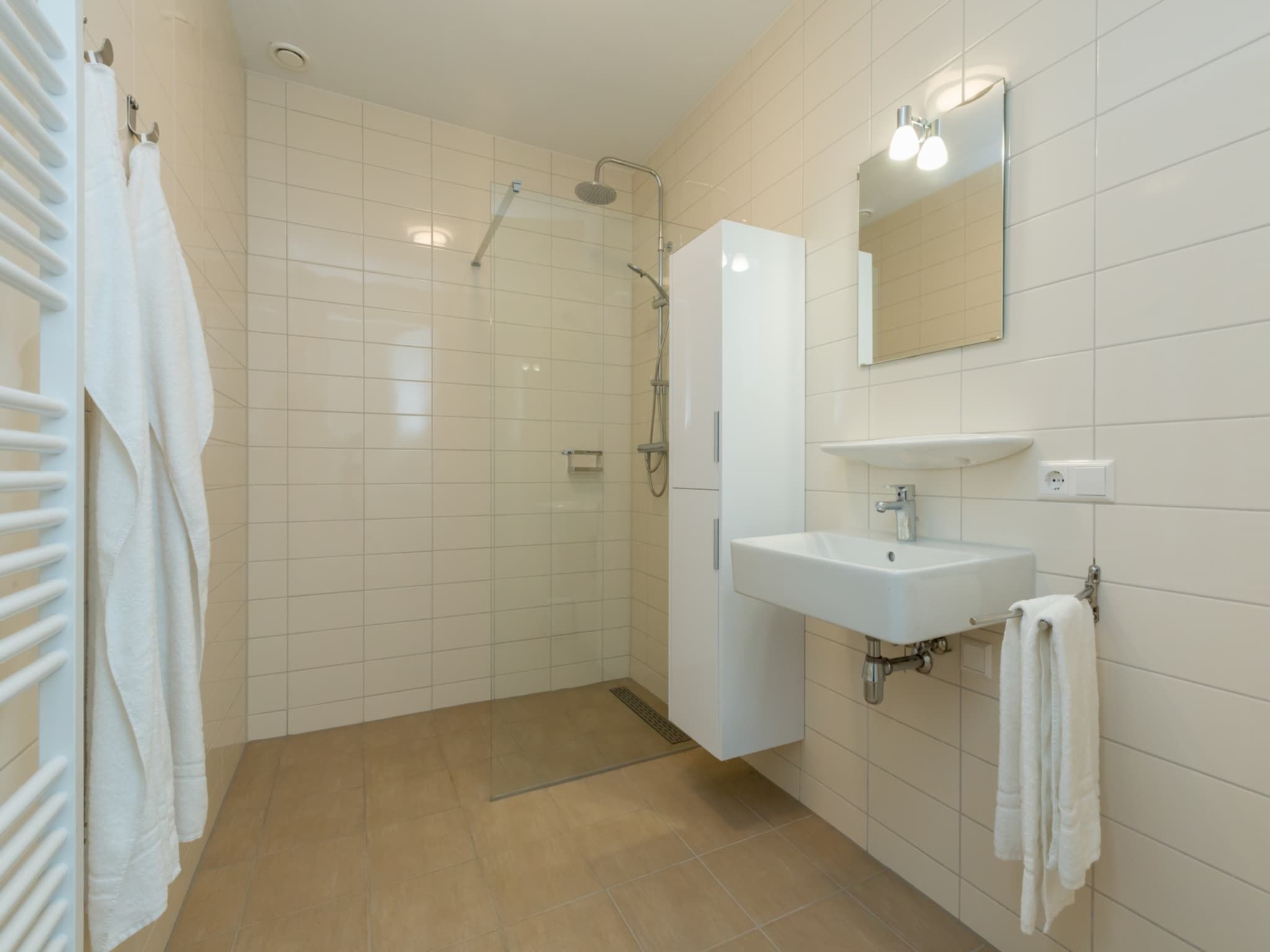 De badkamer van Aparthotel Zoutelande - 4 pers luxe appartement - huisdier in Zoutelande