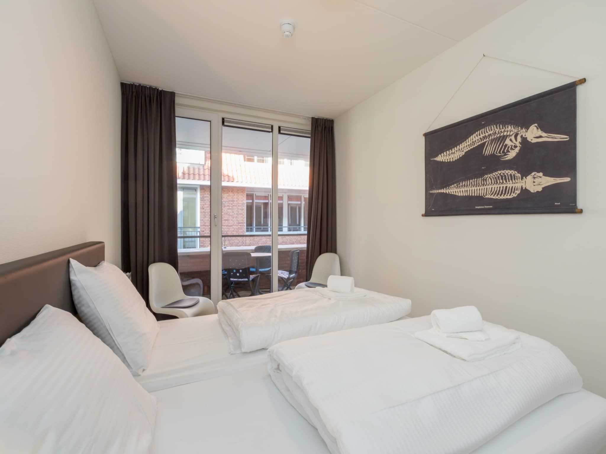 Een slaapkamer van Aparthotel Zoutelande - Luxe 3-persoons comfort appartement in Zoutelande
