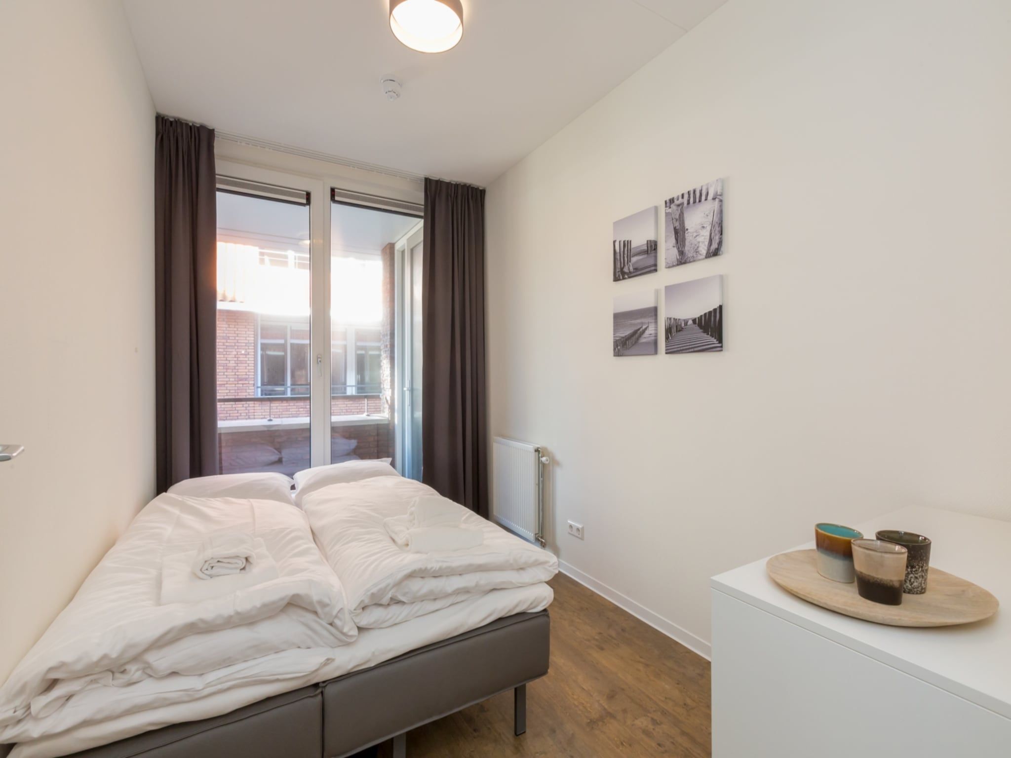 Een slaapkamer van Aparthotel Zoutelande - Luxe 3-persoons comfort appartement in Zoutelande