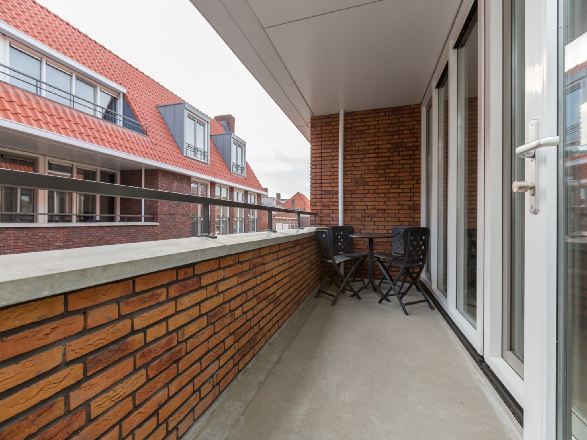 Het terras van Aparthotel Zoutelande - Luxe 3-persoons comfort appartement in Zoutelande
