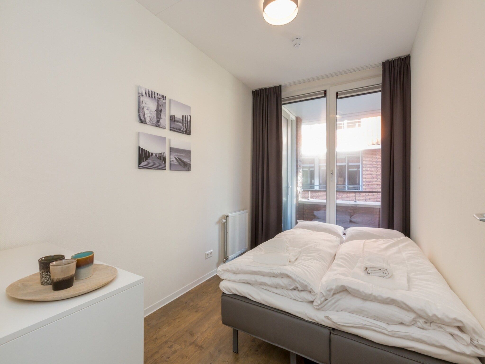 Een slaapkamer van Aparthotel Zoutelande - Luxe 3-persoons comfort appartement in Zoutelande