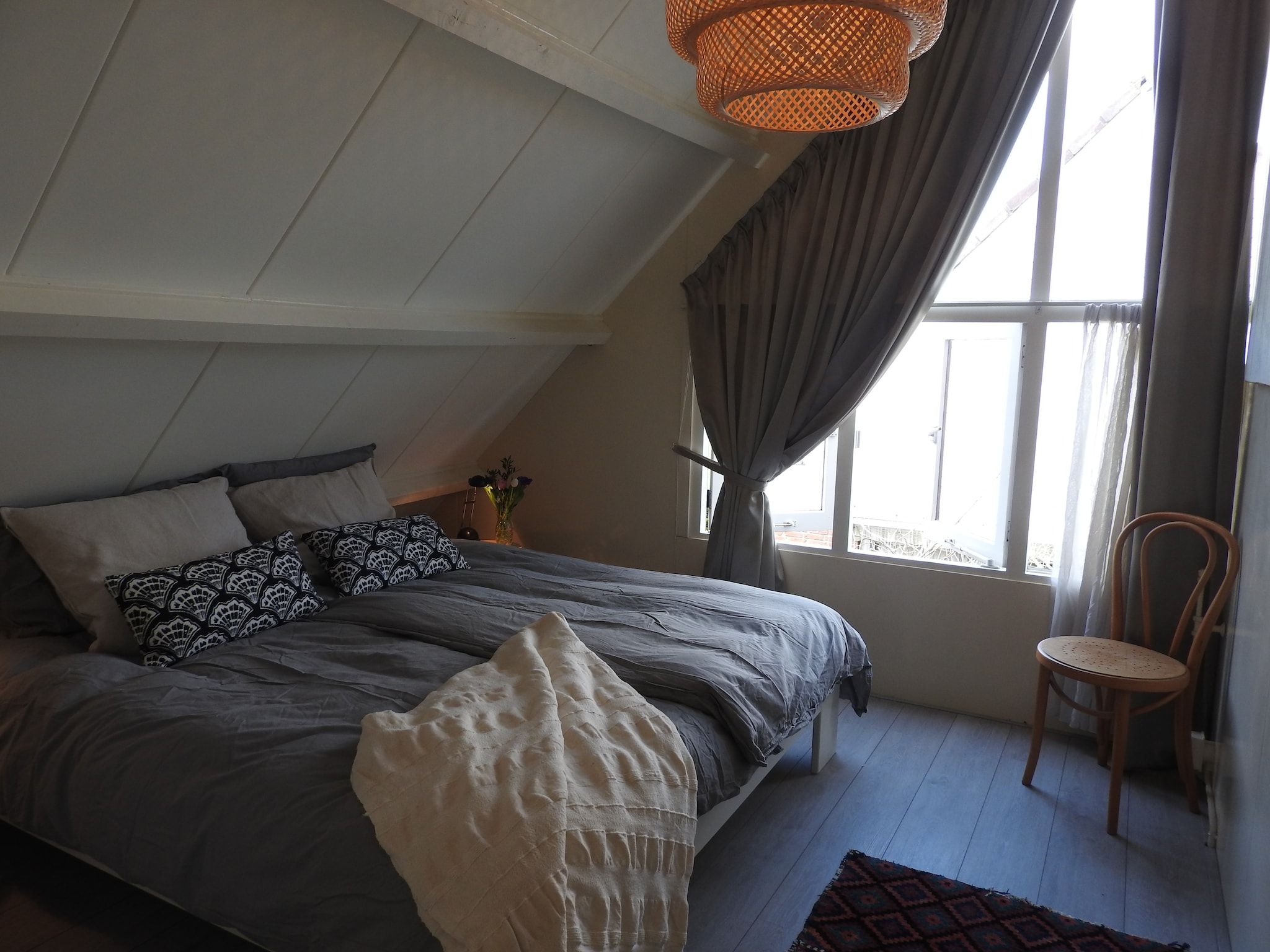 Een slaapkamer van June's Cabin in Noordwijkerhout