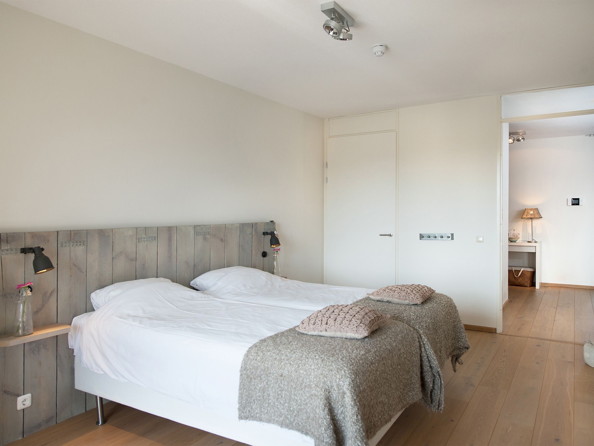 Een slaapkamer van Scheveningen Harbour 24a in Scheveningen