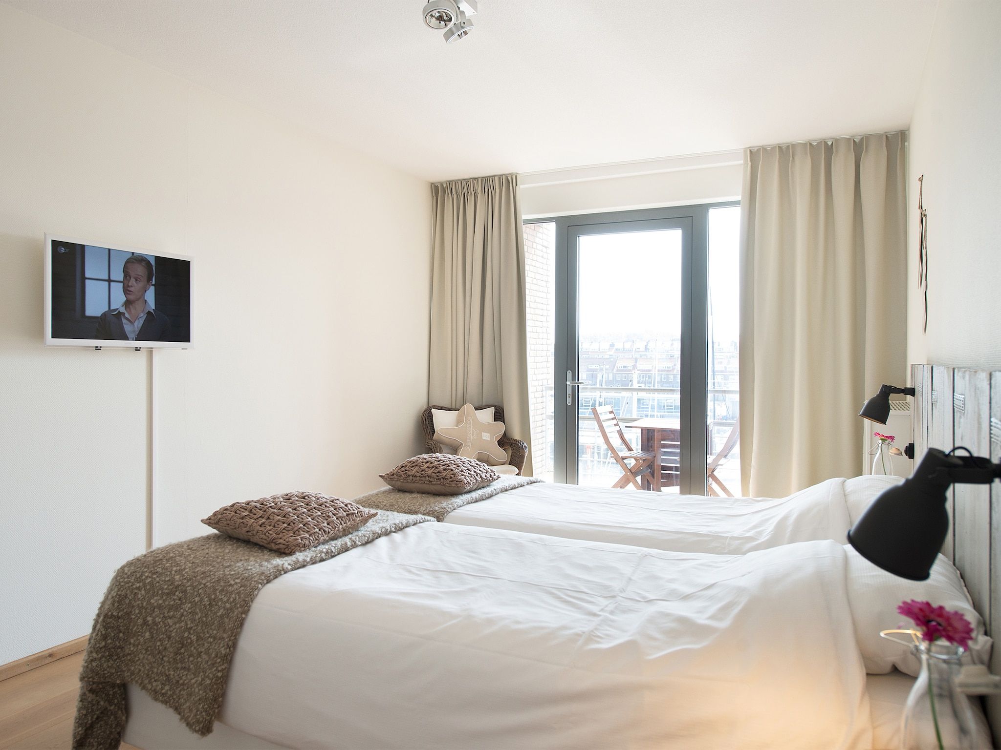 Een slaapkamer van Scheveningen Harbour 24a in Scheveningen