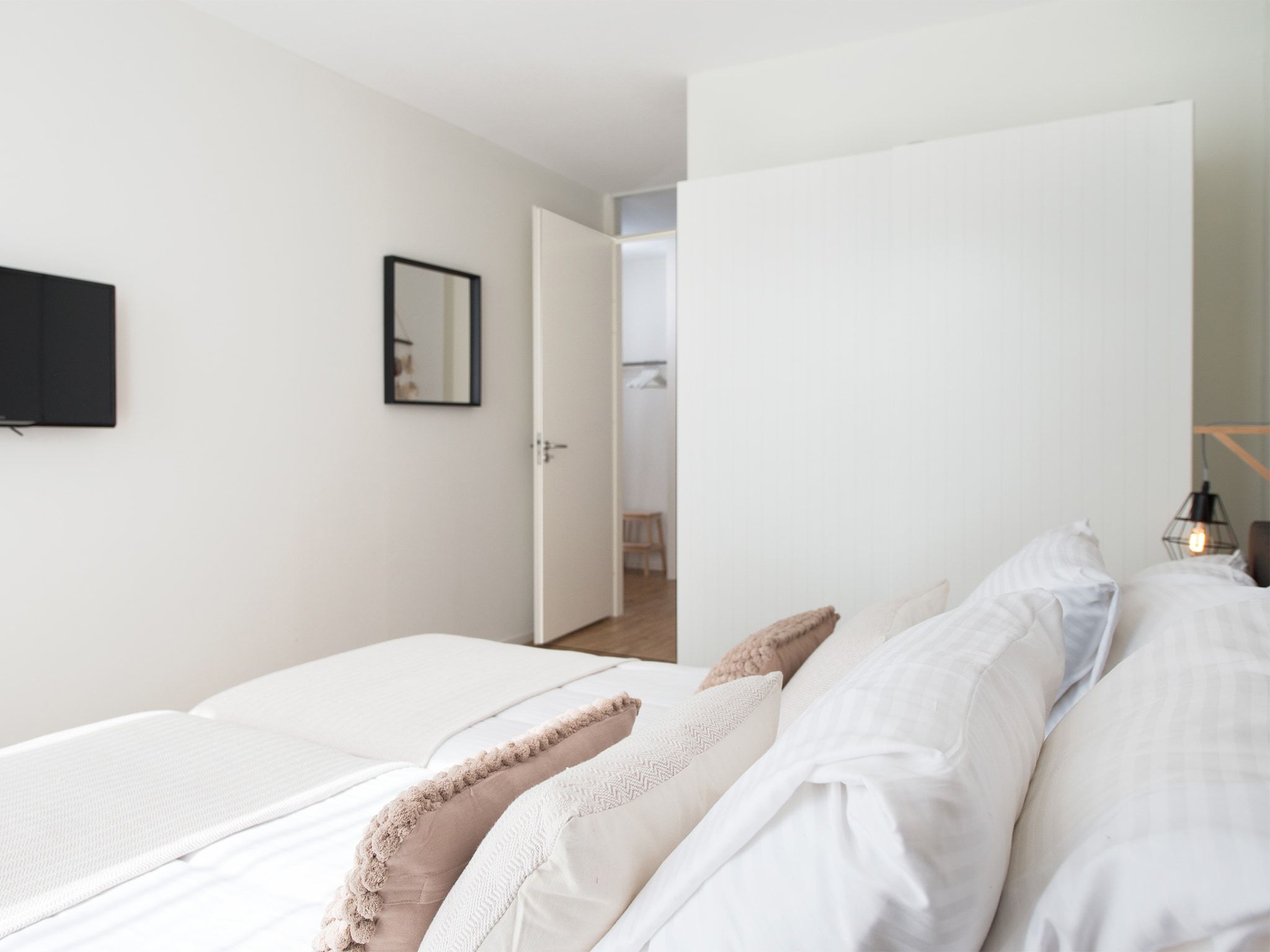 Een slaapkamer van Scheveningen Harbour 60 in Scheveningen