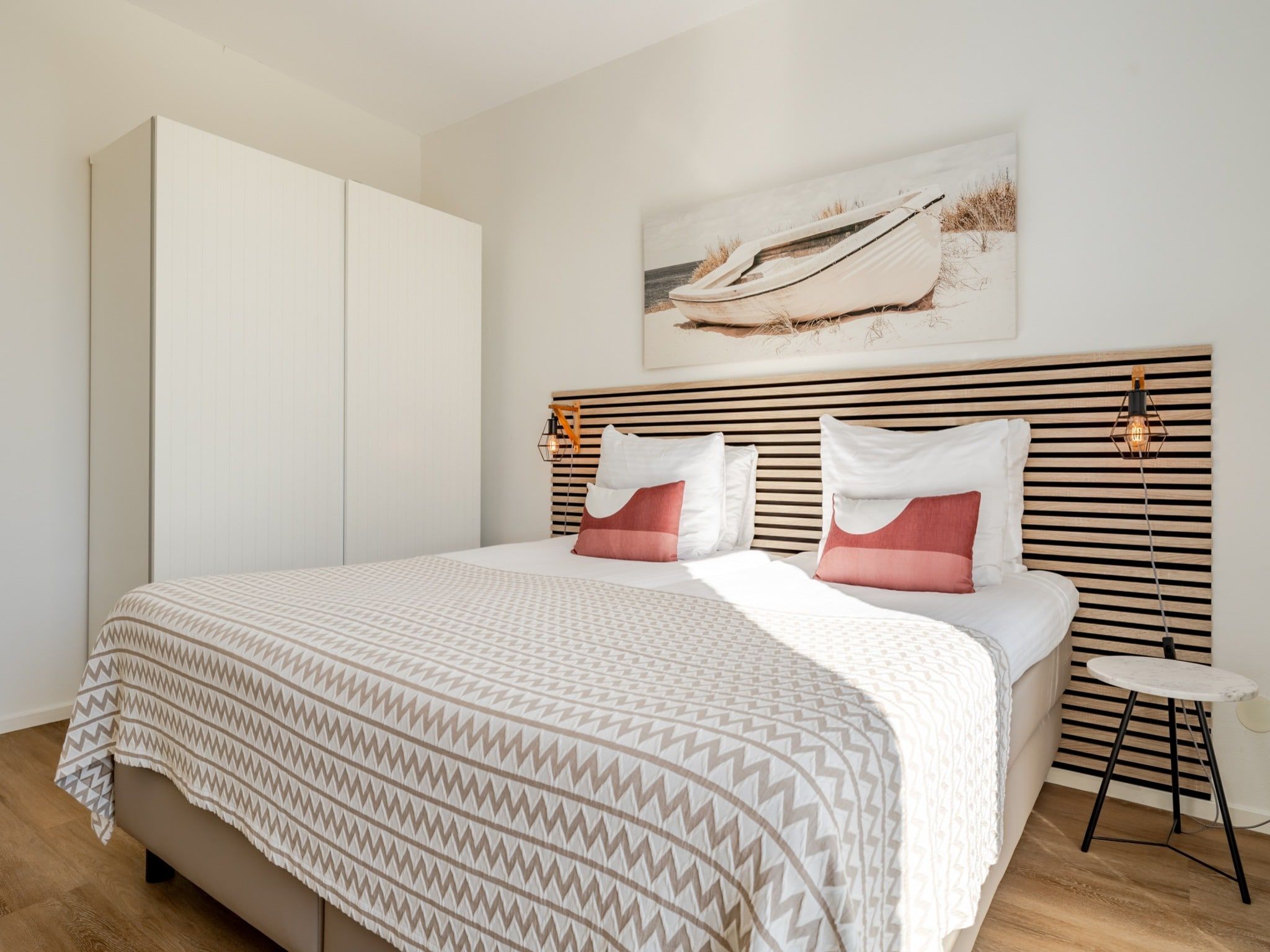 Een slaapkamer van Scheveningen Harbour 60 in Scheveningen