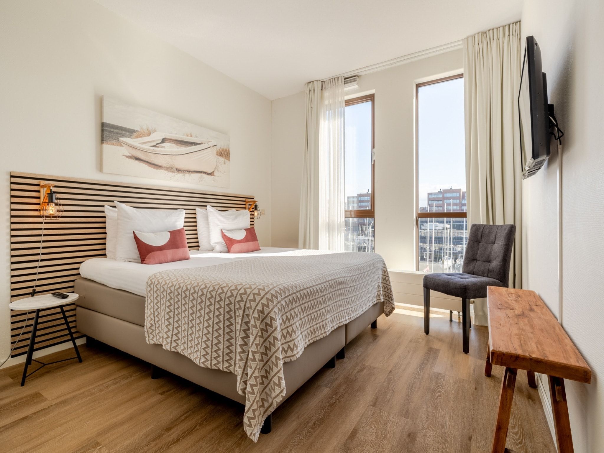 Een slaapkamer van Scheveningen Harbour 60 in Scheveningen