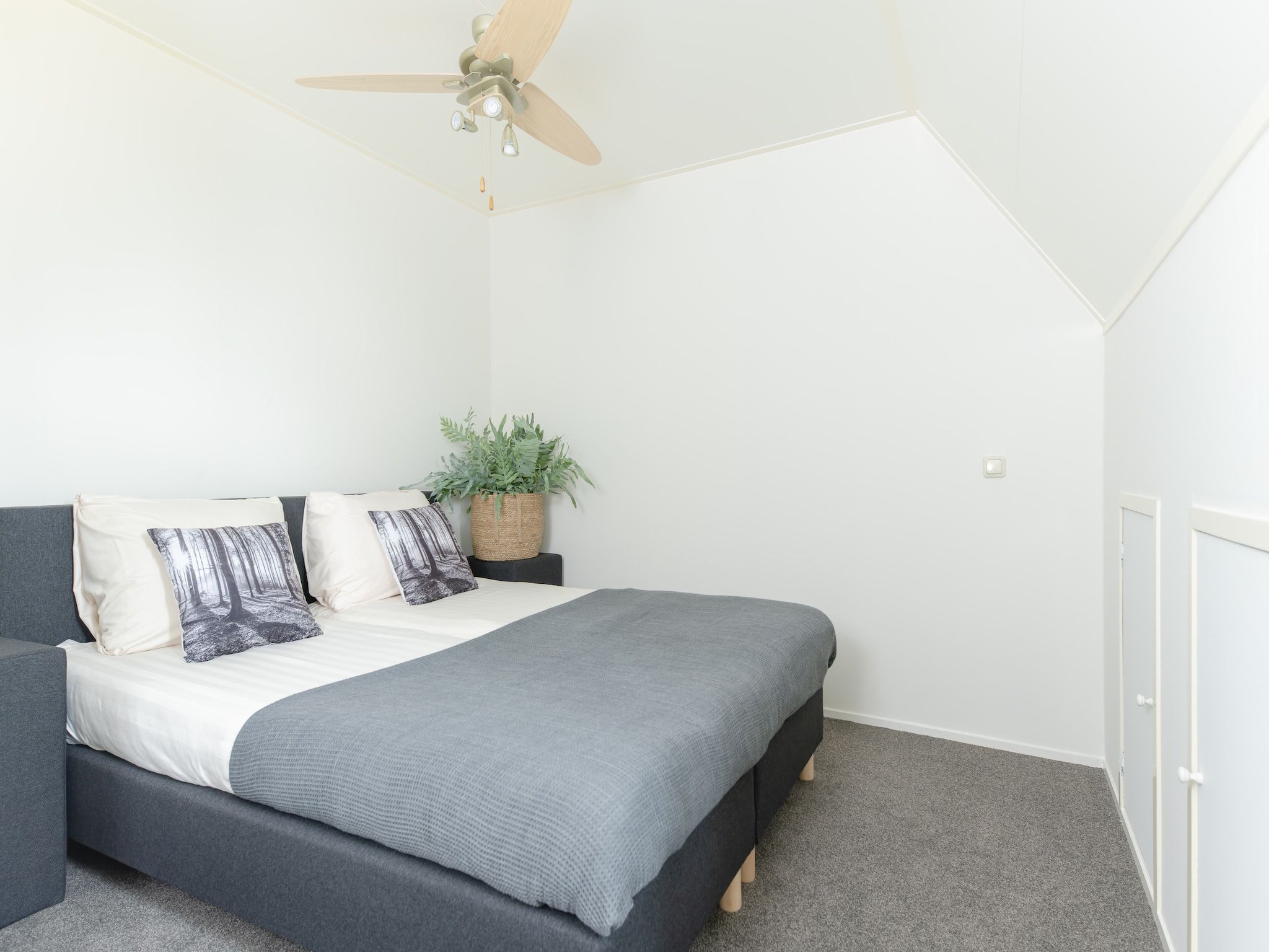 Een slaapkamer van Vakantiepark Mölke 16 in Zuna
