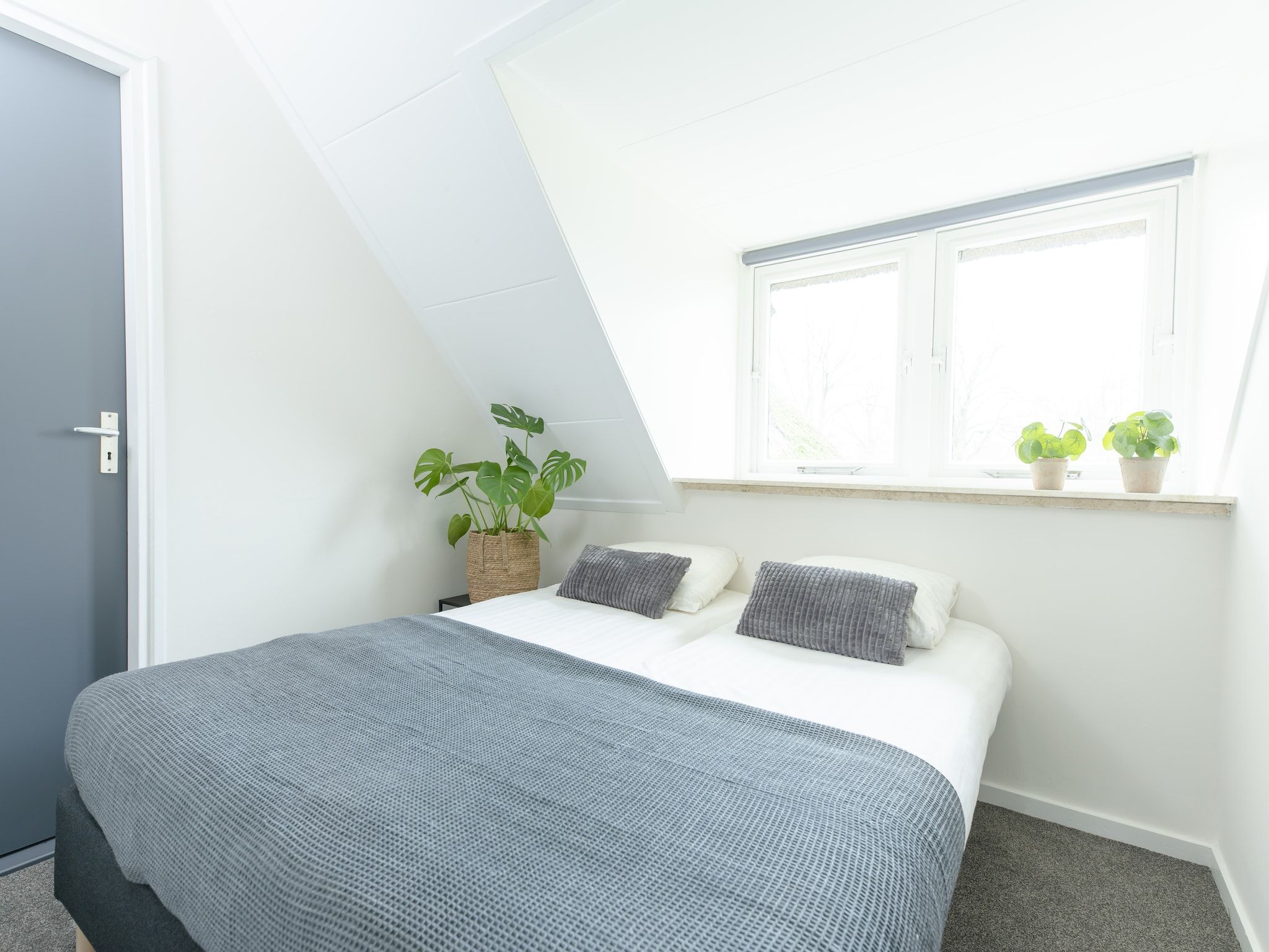 Een slaapkamer van Vakantiepark Mölke 16 in Zuna