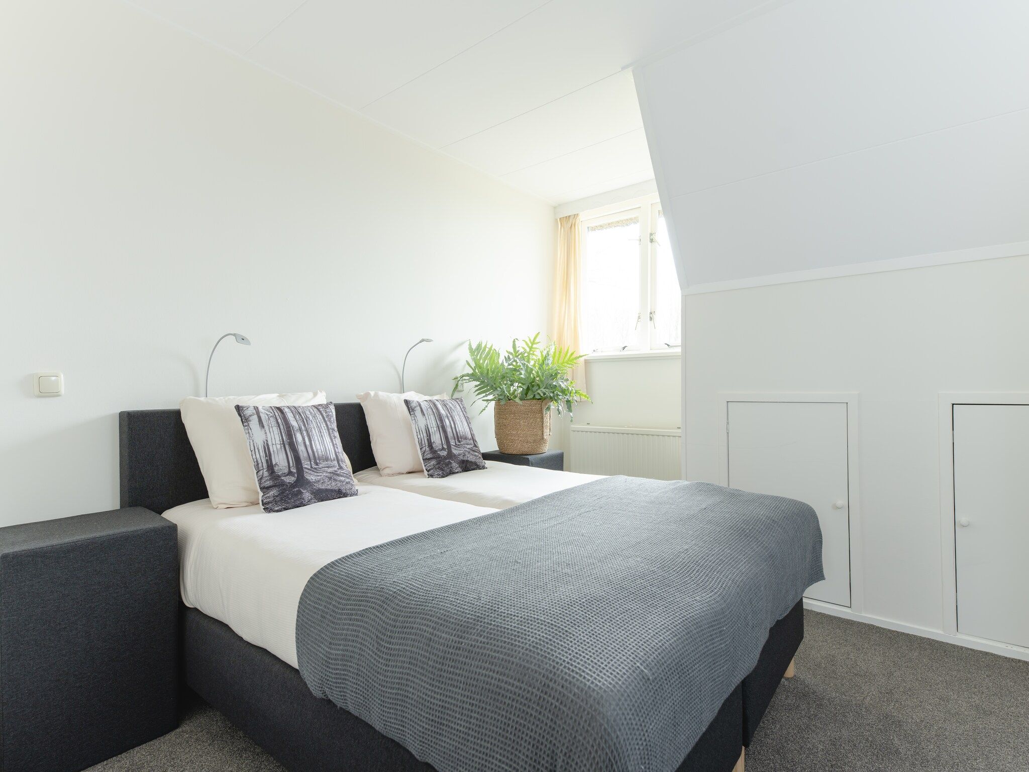 Een slaapkamer van Vakantiepark Mölke 16 in Zuna