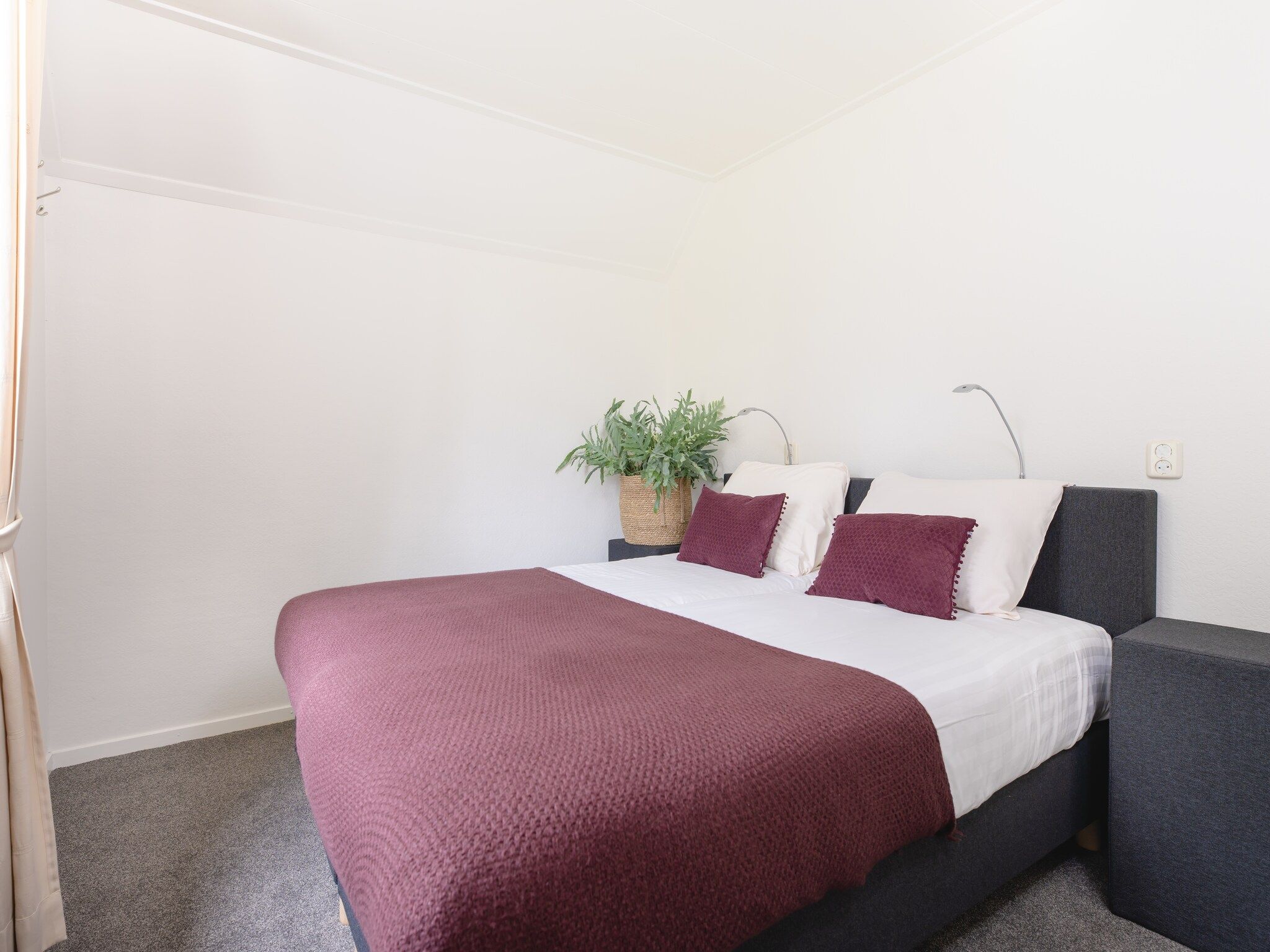 Een slaapkamer van Vakantiepark Mölke 16 in Zuna