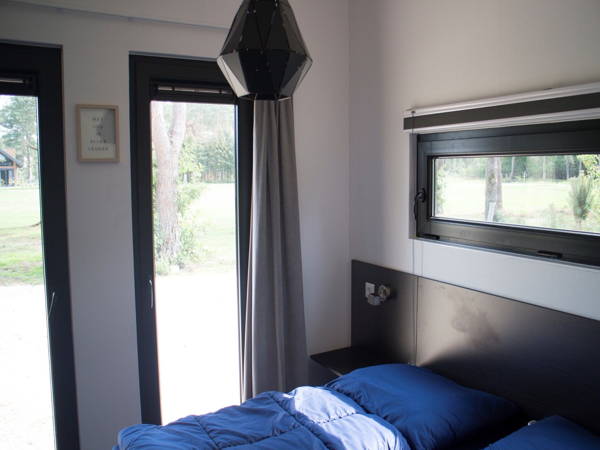 Een slaapkamer van Pavilion 4 in Otterlo