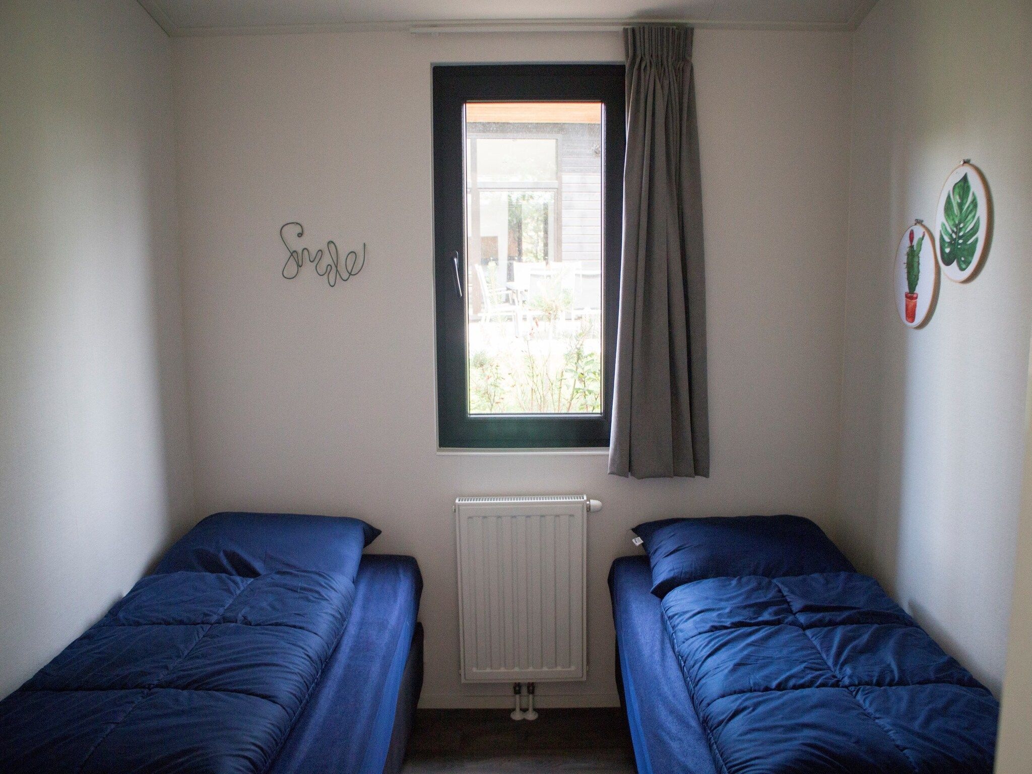 Een slaapkamer van Pavilion 4 in Otterlo