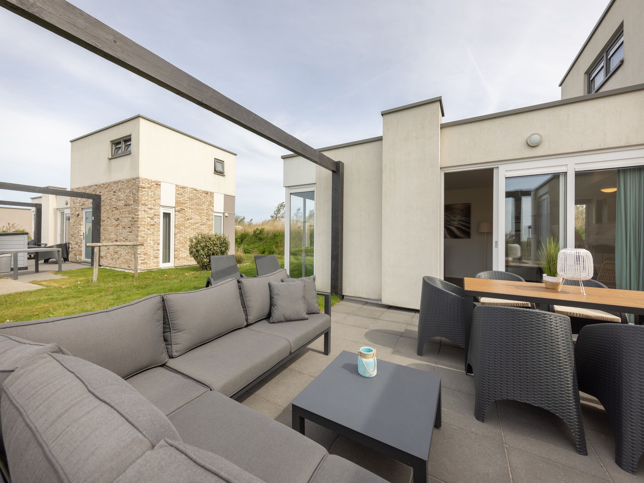 De tuin van Vakantiepark Callassande 3 in Callantsoog