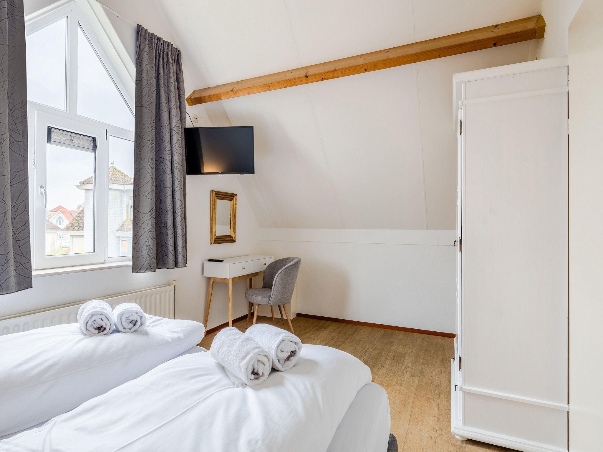 Een slaapkamer van Noordzee Résidence De Banjaard 13 in Kamperland