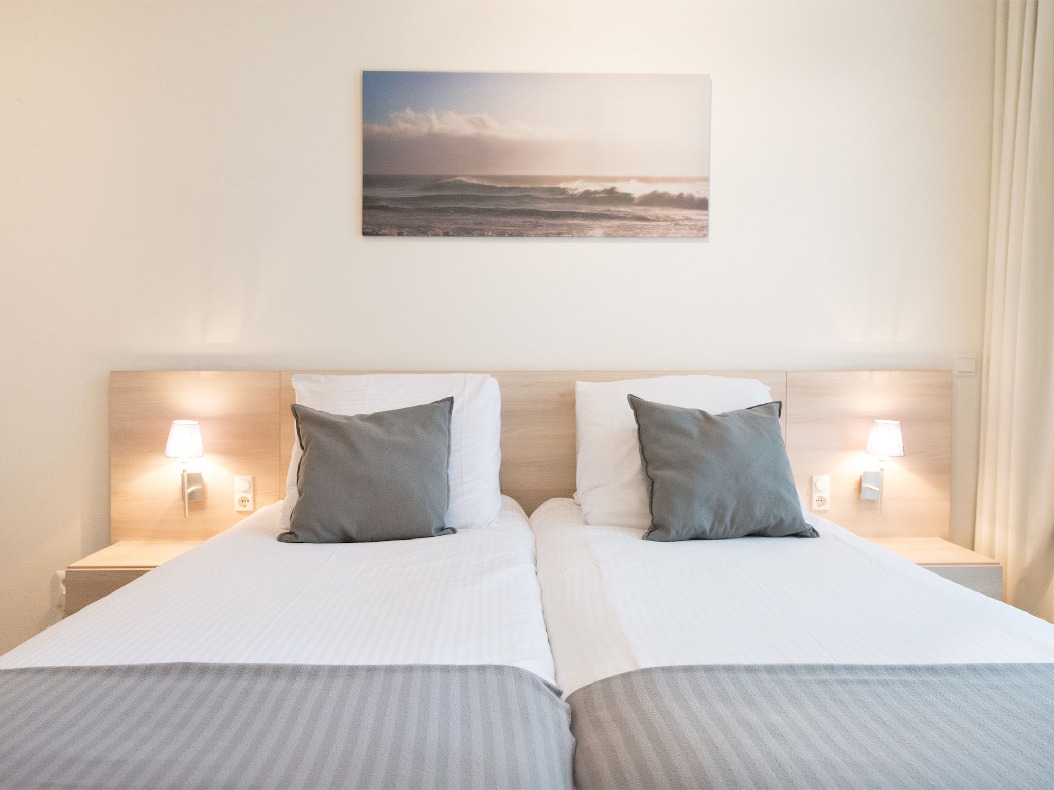 Een slaapkamer van Scheveningen Harbour 54c in Scheveningen