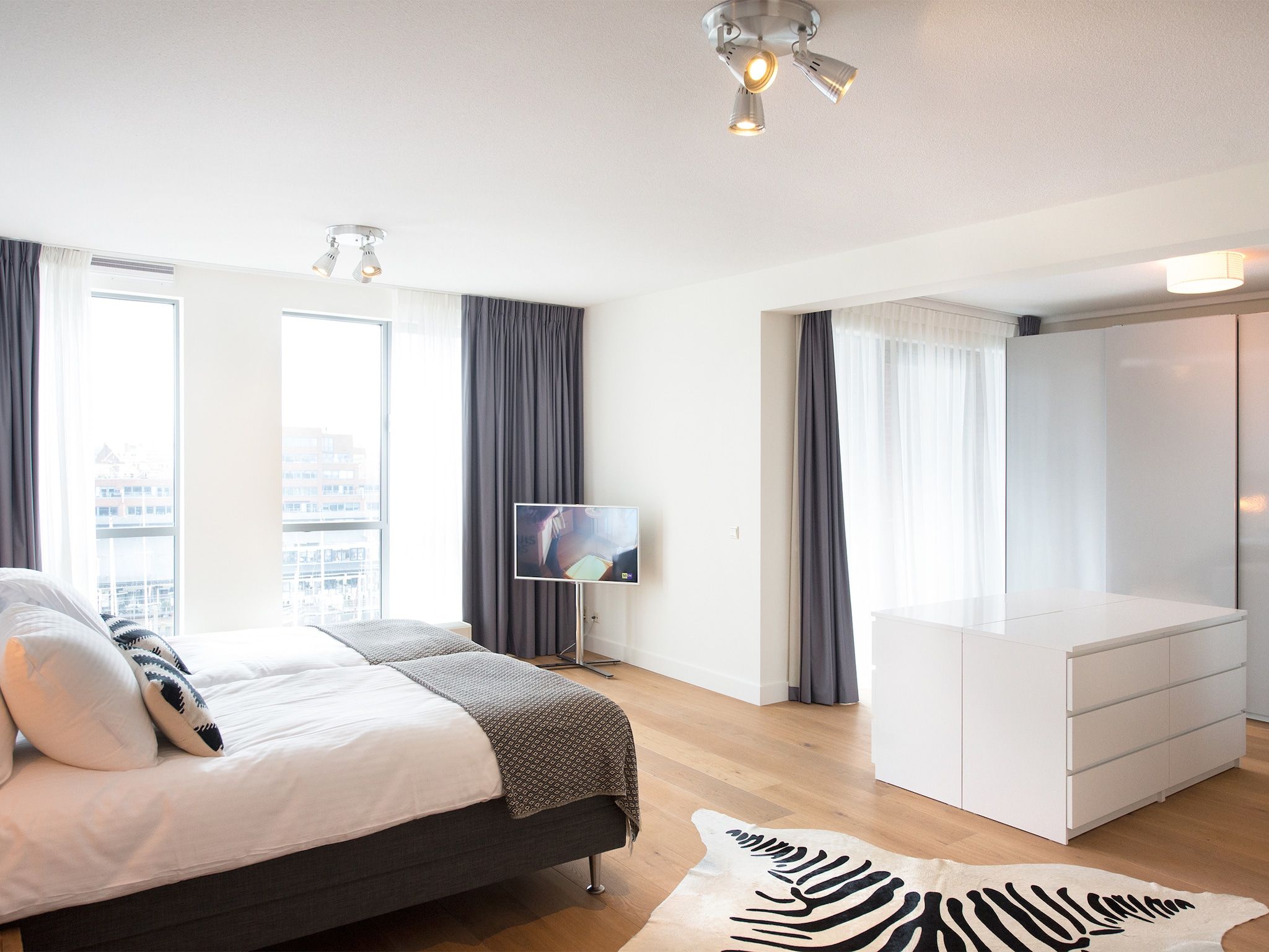 Een slaapkamer van Scheveningen Harbour 70A in Scheveningen
