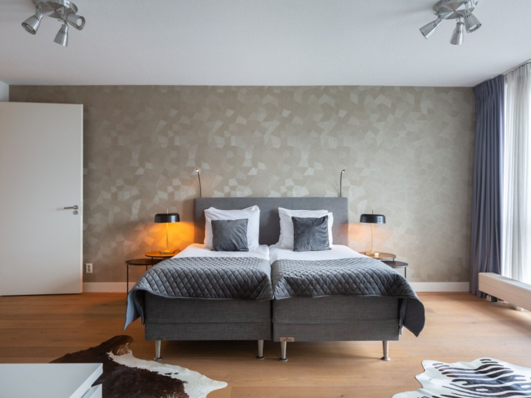 Een slaapkamer van Scheveningen Harbour 70A in Scheveningen