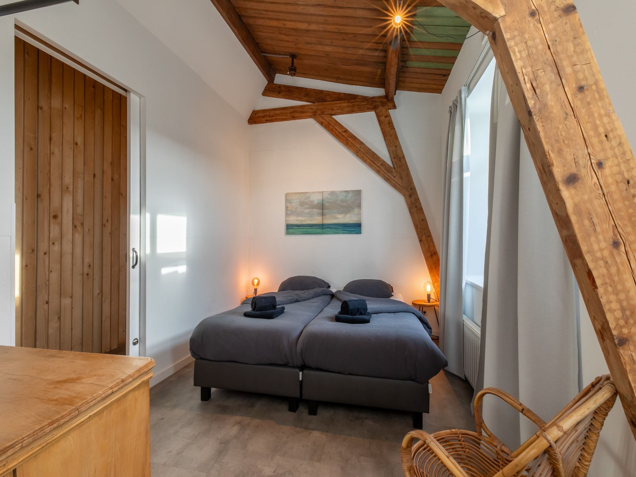 Een slaapkamer van Pleinzicht 6b in Koudekerke