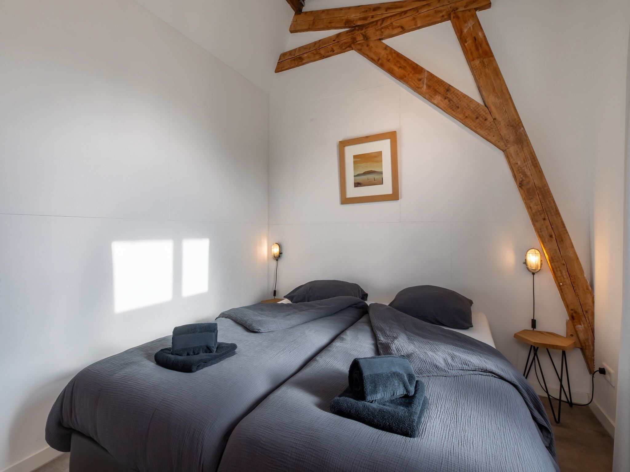 Een slaapkamer van Pleinzicht 6c in Koudekerke