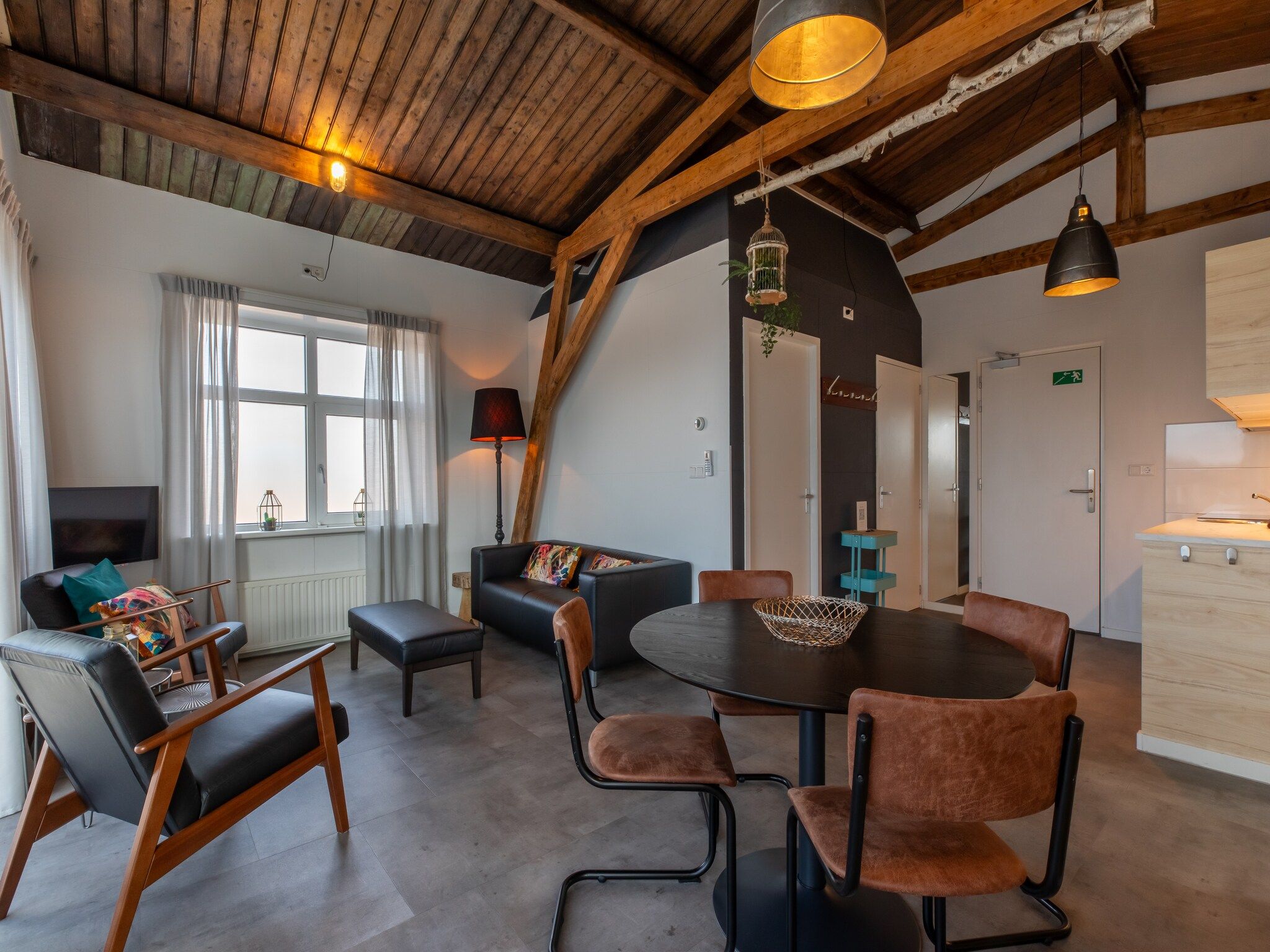 De woonkamer van Pleinzicht 6c in Koudekerke