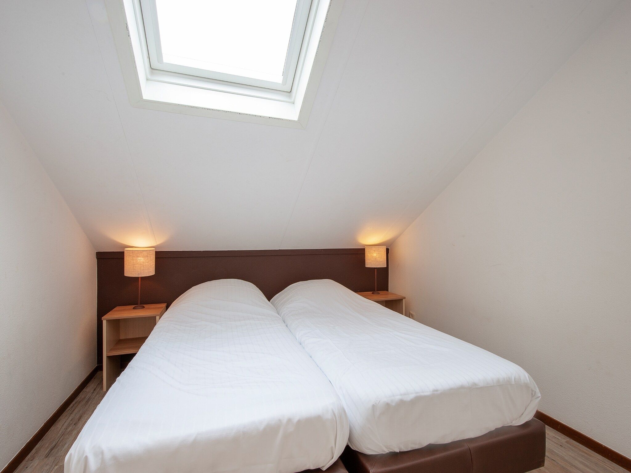 Een slaapkamer van Resort Arcen 18 in Arcen