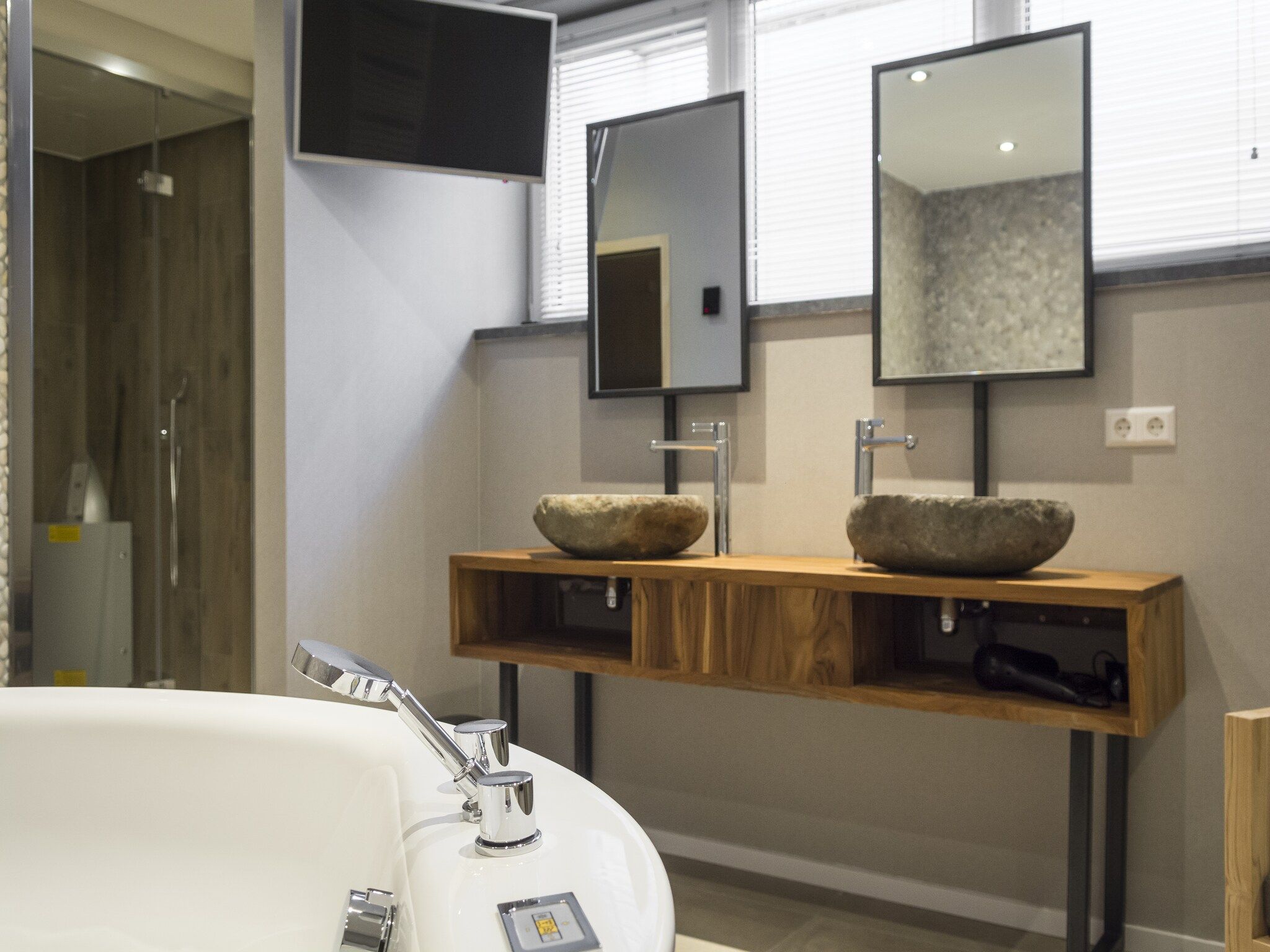 De badkamer van Villa Bouwlust F Wellness in De Cocksdorp Texel