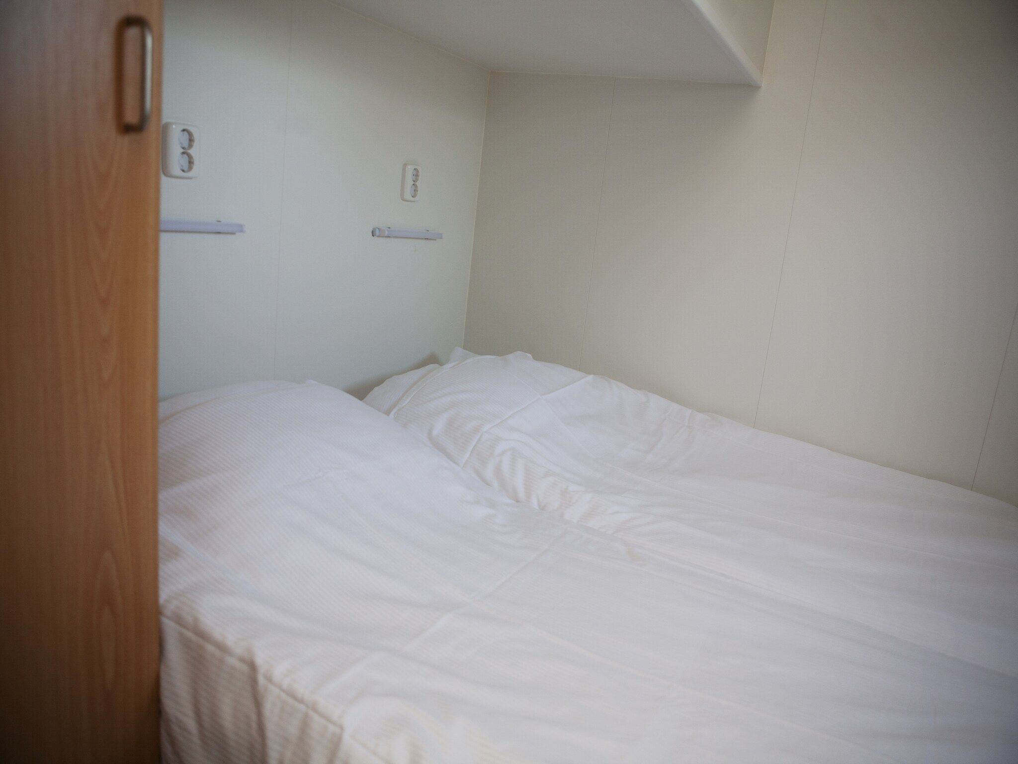 Een slaapkamer van Recreatiepark de Boshoek 22 in Voorthuizen